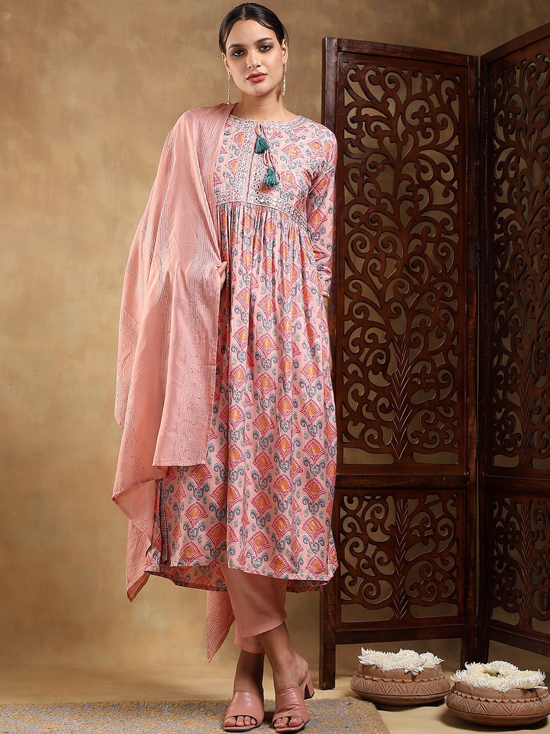 Bani Women Ethnic Motifs Printed Embroidered Pleated Kurta with Trouser & Dupatta, Peach
Bani Women Ethnic Motifs Printed Embroidered Pleated Kurta with Trouser & Dupatta, Peach
