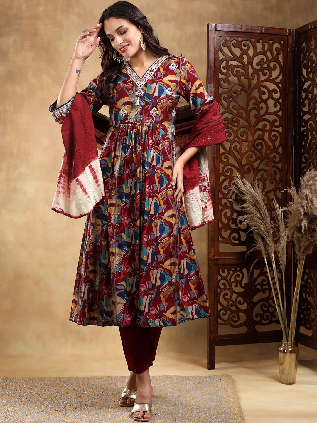 Bani Women Ethnic Motifs Printed Embroidered Pleated Kurta with Trouser & Dupatta, Maroon
Bani Women Ethnic Motifs Printed Embroidered Pleated Kurta with Trouser & Dupatta, Maroon
