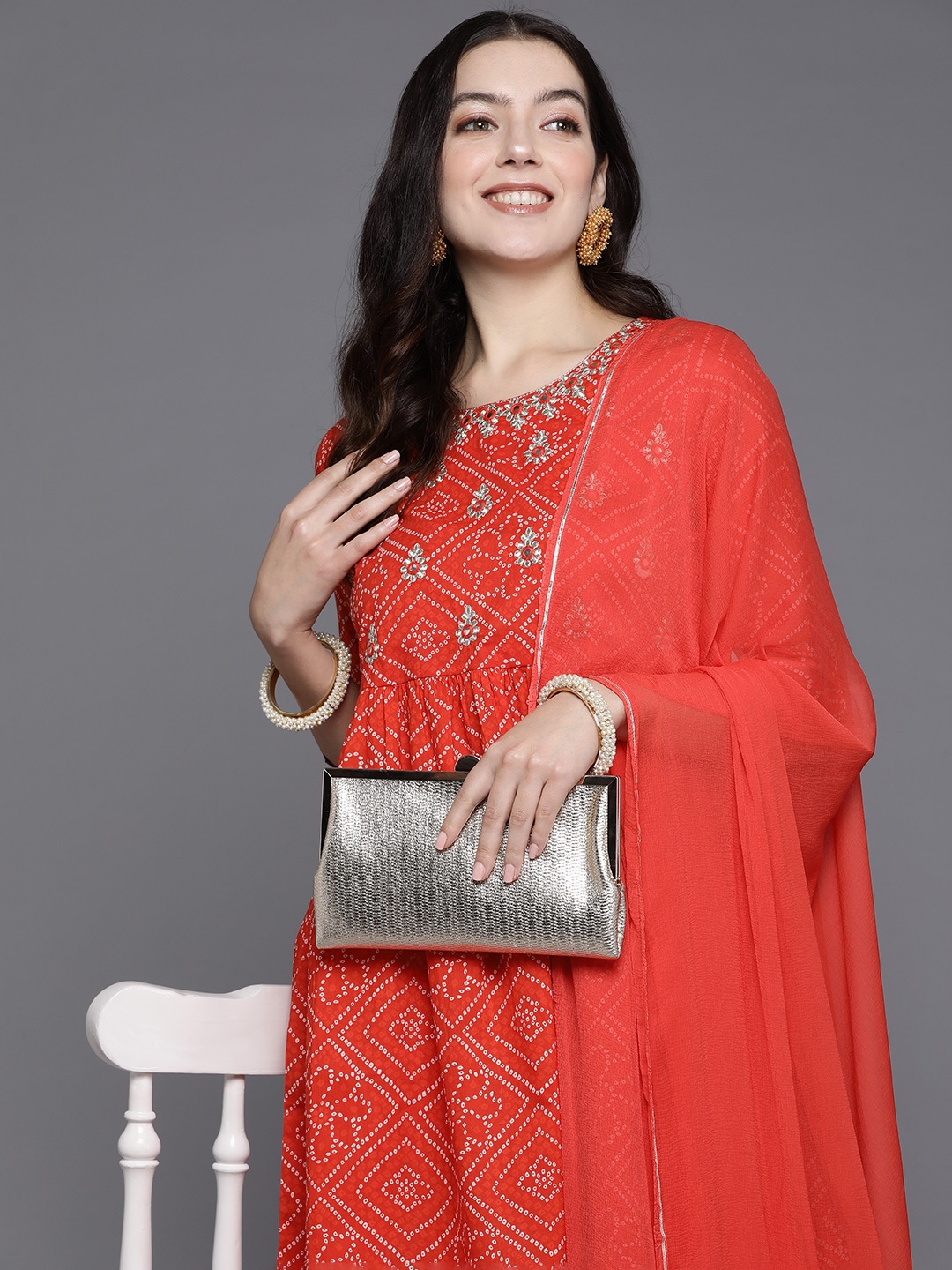 Indo Era Bandhani Embroidered Pleated Beads & Stones Kurta with Sharara & Dupatta, Red
Indo Era Bandhani Embroidered Pleated Beads & Stones Kurta with Sharara & Dupatta, Red