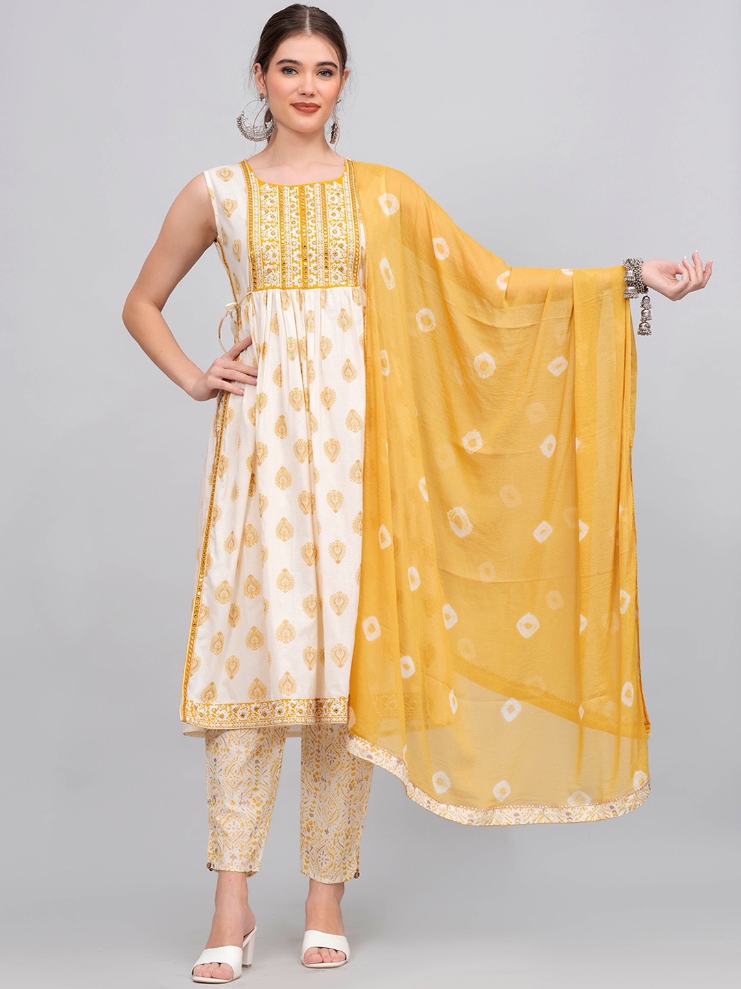 KALINI Ethnic Motifs Printed Mirror Work Pure Cotton Kurta with Trousers & With Dupatta, Yellow
KALINI Ethnic Motifs Printed Mirror Work Pure Cotton Kurta with Trousers & With Dupatta, Yellow