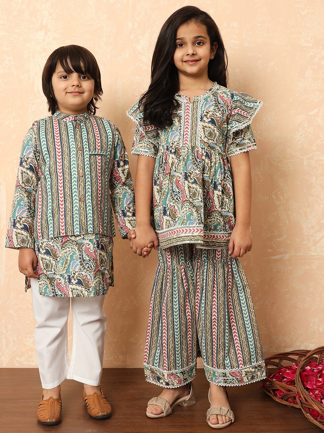 Readiprint Girls Ethnic Motifs Printed Gotta Patti Pure Cotton Kurti with Sharara, Cream
Readiprint Girls Ethnic Motifs Printed Gotta Patti Pure Cotton Kurti with Sharara, Cream