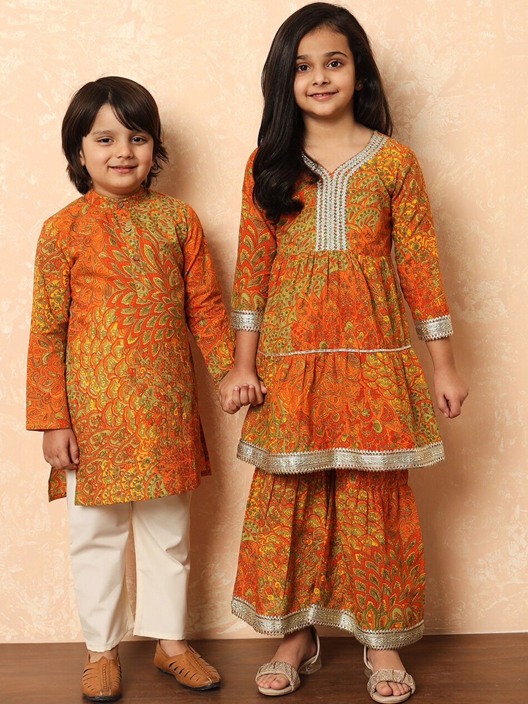 Readiprint Fashions Girls Ethnic Motifs Printed Gotta Patti Pure Cotton Kurti With Sharara, Orange
Readiprint Fashions Girls Ethnic Motifs Printed Gotta Patti Pure Cotton Kurti With Sharara, Orange