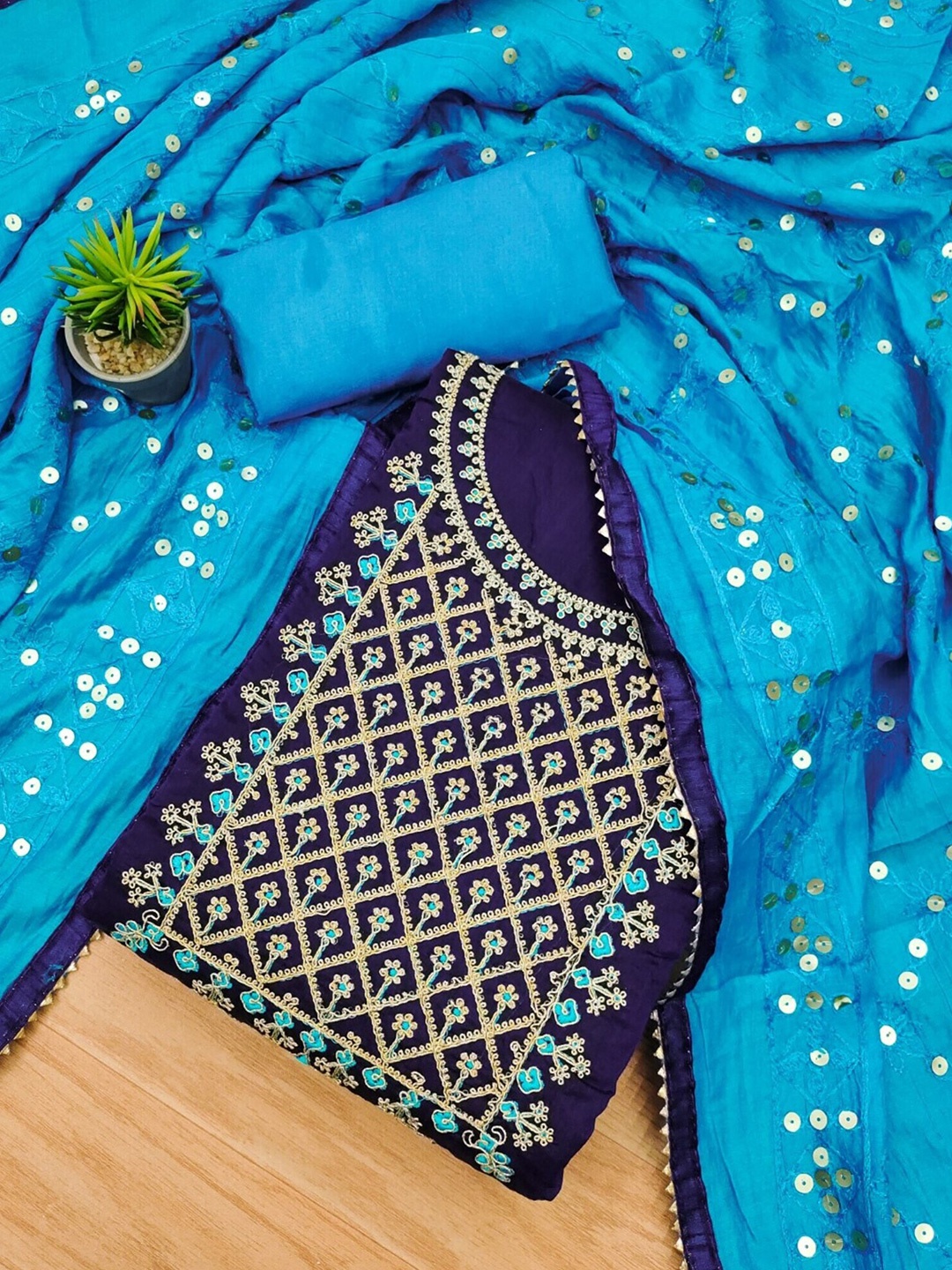 Panzora Floral Embroidered Sequinned Chanderi Silk Unstitched Dress Material, Blue
Panzora Floral Embroidered Sequinned Chanderi Silk Unstitched Dress Material, Blue