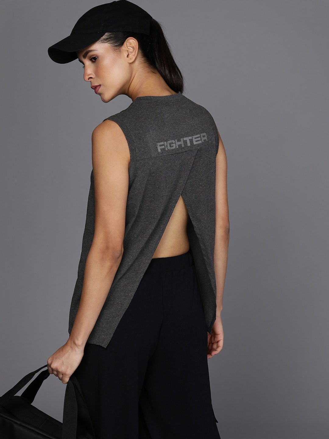 HRX by Hrithik Roshan Fighter Collection Women Printed Cotton Sleeveless T-shirt, Charcoal
HRX by Hrithik Roshan Fighter Collection Women Printed Cotton Sleeveless T-shirt, Charcoal