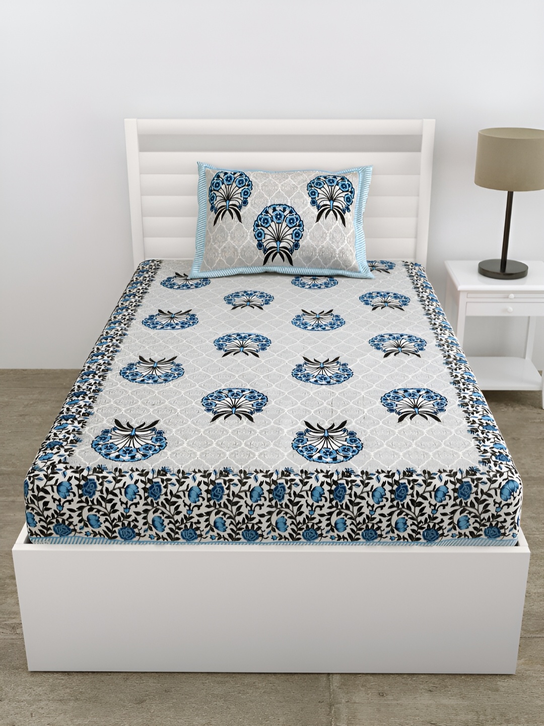 DOLLIFI Blue & Grey Floral Printed Cotton 180 TC Single Bedsheet With 1 Pillow Cover
DOLLIFI Blue & Grey Floral Printed Cotton 180 TC Single Bedsheet With 1 Pillow Cover