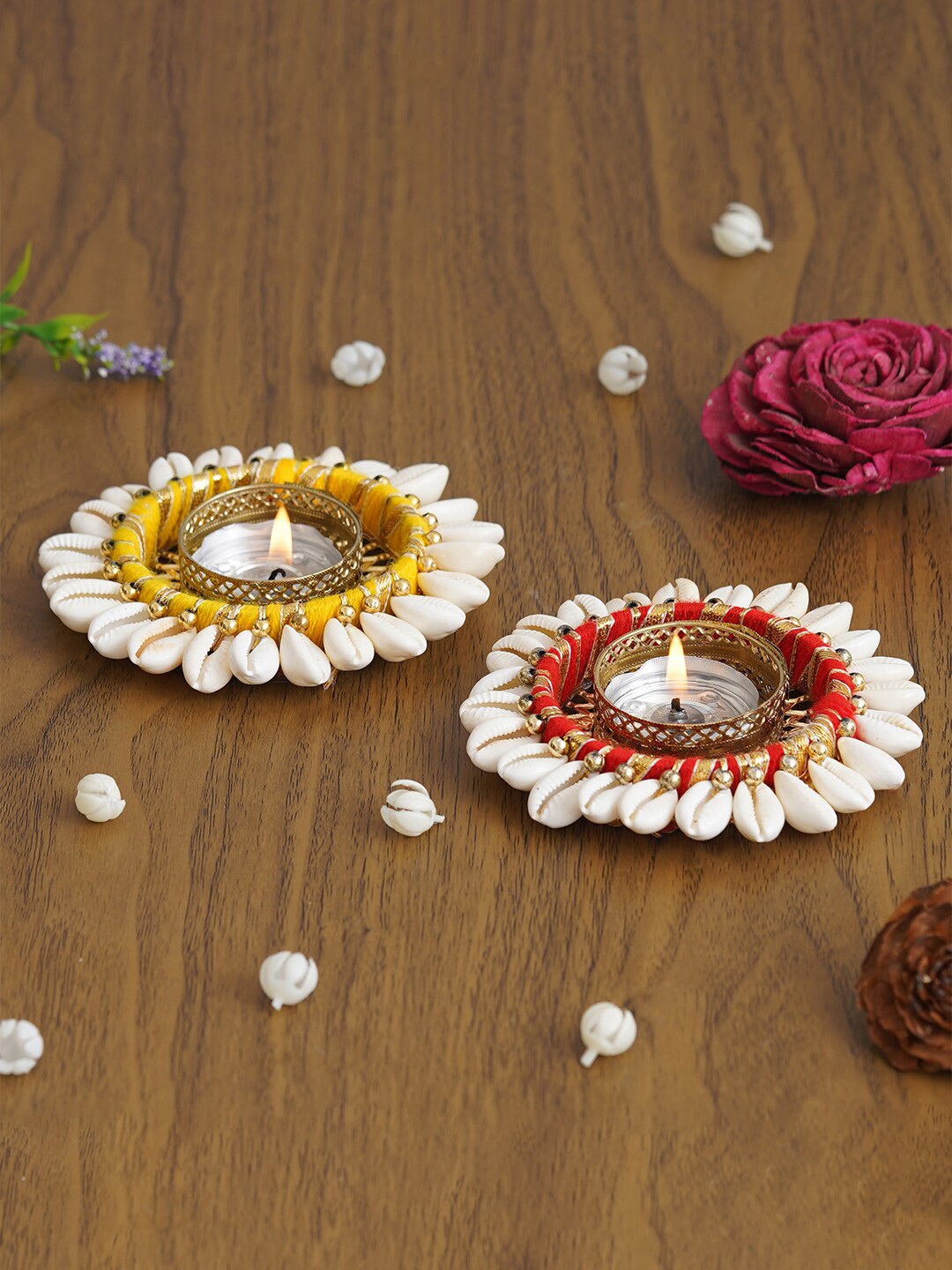 eCraftIndia Yellow & Gold-Toned 2 Pieces Cowrie Shell Round Metal Tea Light Candle Holders
eCraftIndia Yellow & Gold-Toned 2 Pieces Cowrie Shell Round Metal Tea Light Candle Holders