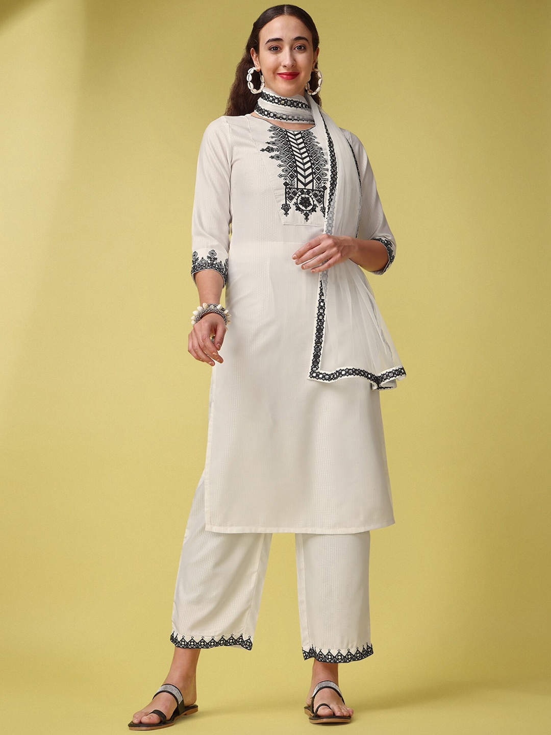 KALINI Round Neck Embroidered Thread Work Straight Kurta with Trousers & Dupatta, White
KALINI Round Neck Embroidered Thread Work Straight Kurta with Trousers & Dupatta, White