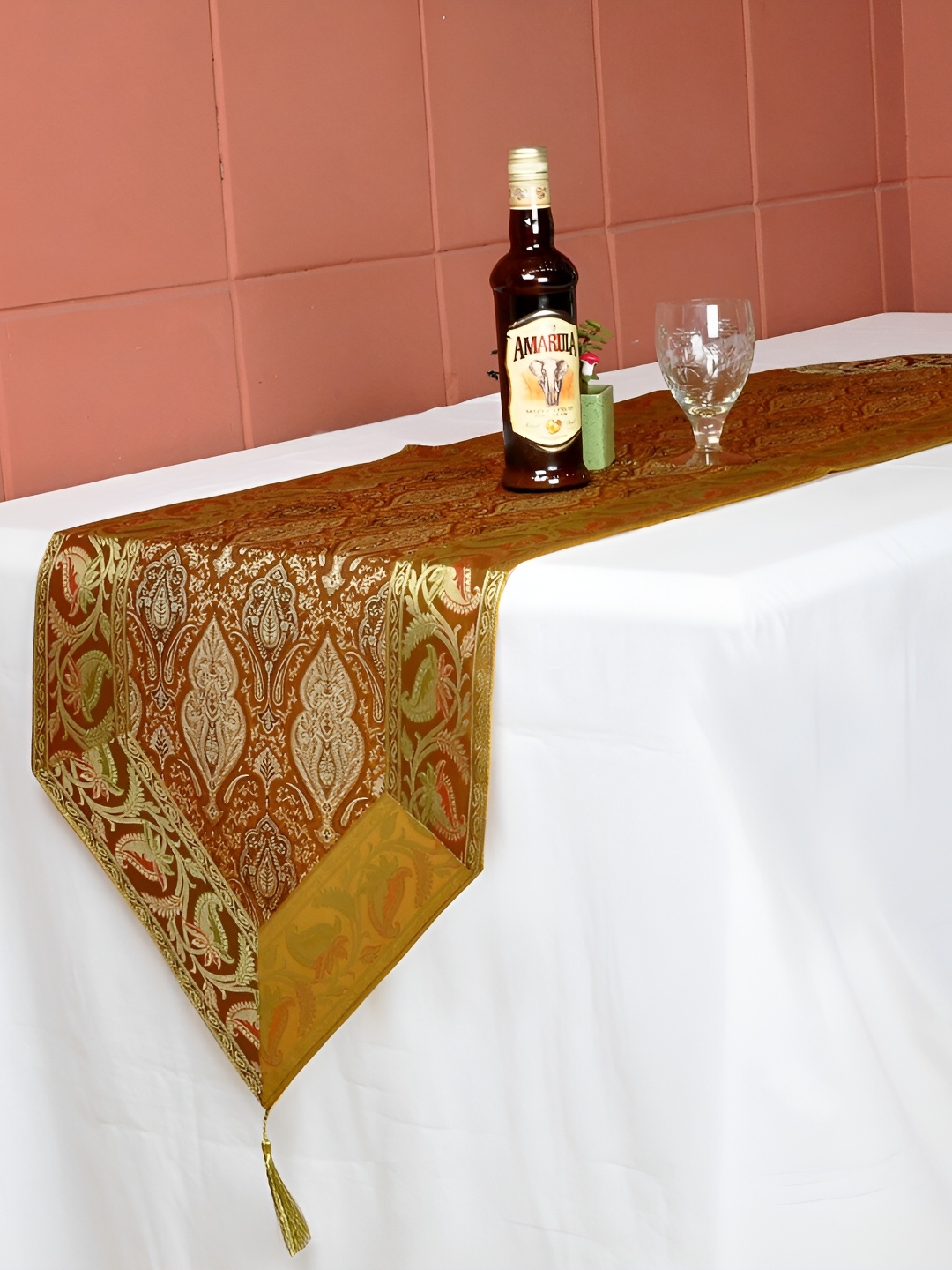 Lal Haveli Red & Gold-Toned Ethnic Motifs Silk Brocade Rectangle Center Table Runner
Lal Haveli Red & Gold-Toned Ethnic Motifs Silk Brocade Rectangle Center Table Runner