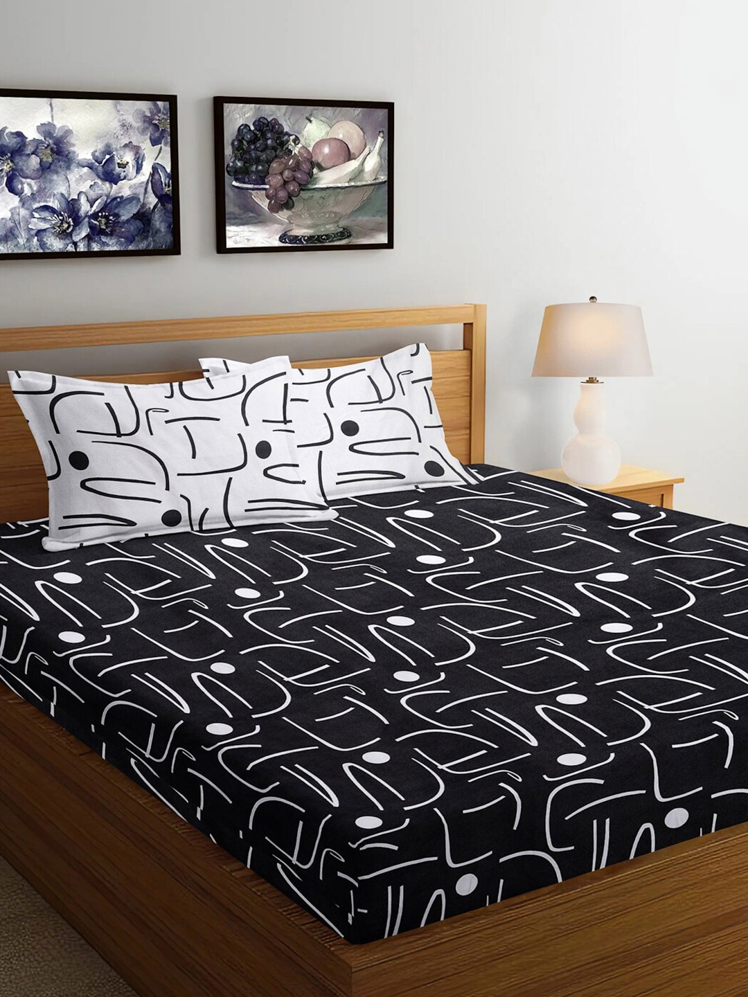 Arrabi Black & White Geometric Printed 300 TC King Bedsheet with 2 Pillow Covers
Arrabi Black & White Geometric Printed 300 TC King Bedsheet with 2 Pillow Covers