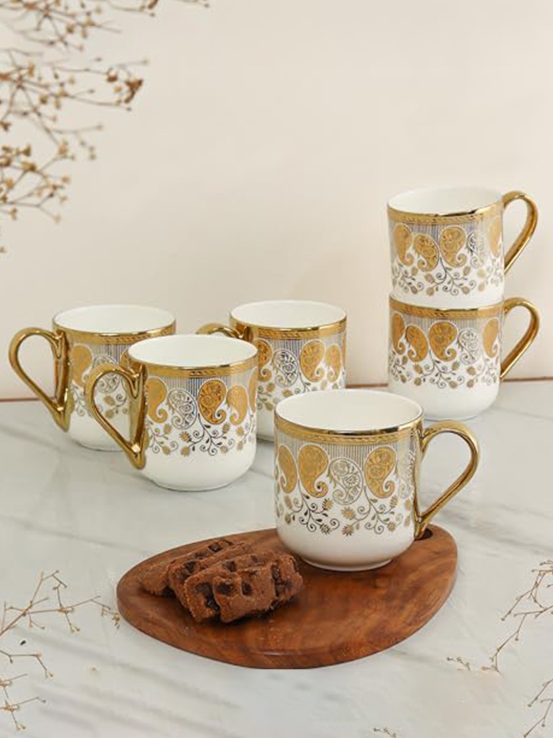 Femora Gold Toned & White 6 Pieces Ethnic Motifs Printed Bone China Glossy Cups 180ml
Femora Gold Toned & White 6 Pieces Ethnic Motifs Printed Bone China Glossy Cups 180ml