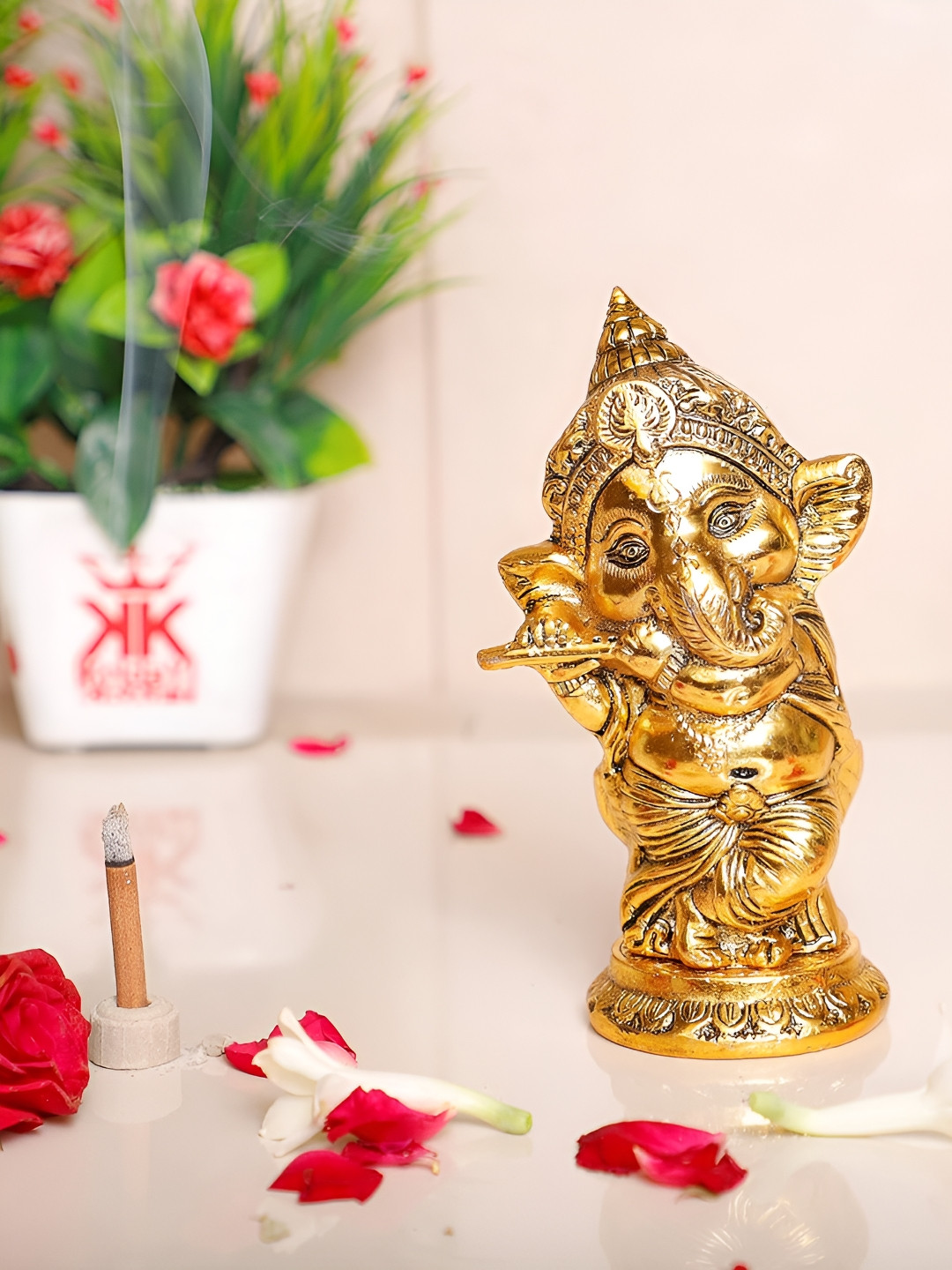 Kridaykraft Gold-Toned Bansuri Ganesh Showpiece
Kridaykraft Gold-Toned Bansuri Ganesh Showpiece