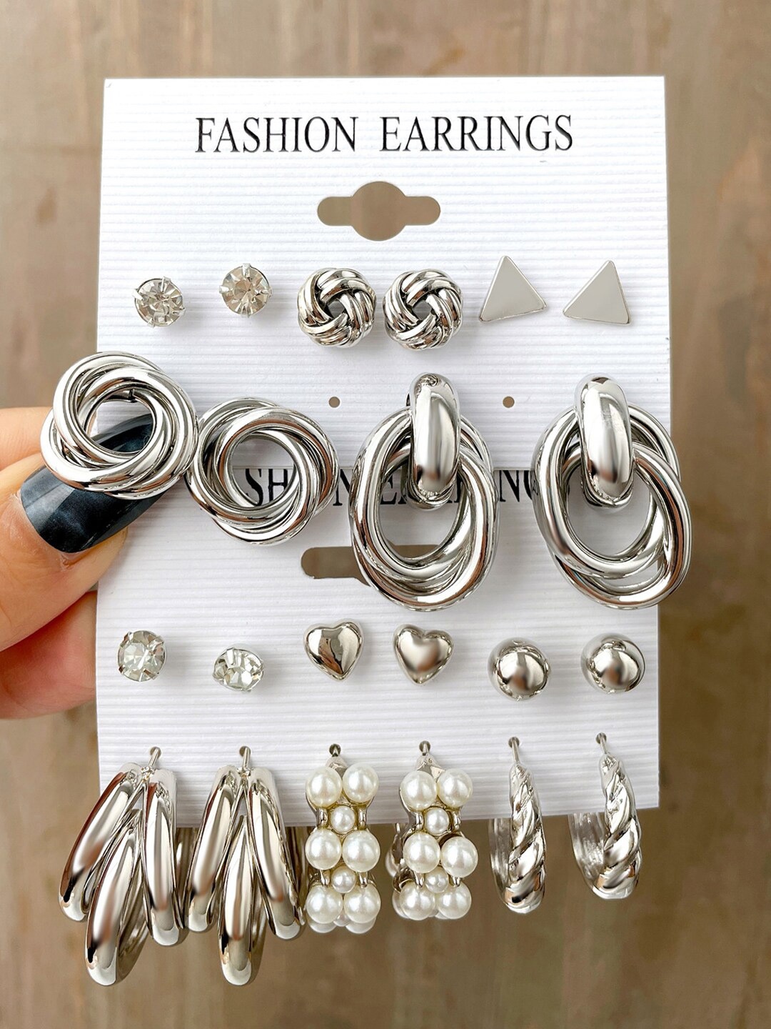 Shining Diva Fashion Set Of 11 Silver-Plated Stone-Studded Beaded Studs & Hoop Earrings
Shining Diva Fashion Set Of 11 Silver-Plated Stone-Studded Beaded Studs & Hoop Earrings