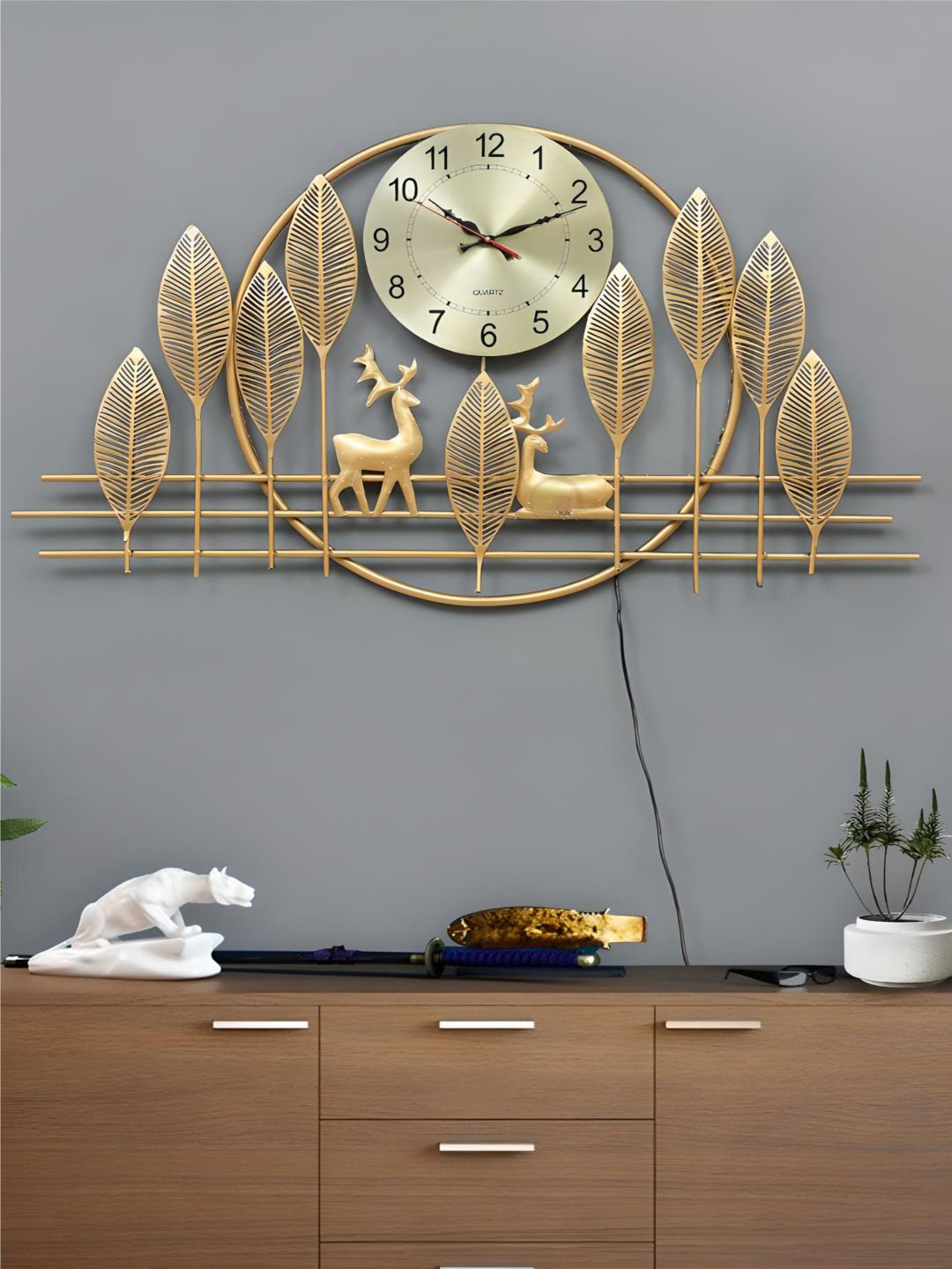 The Art House Gold Toned Abstract Shaped Wall Clock
The Art House Gold Toned Abstract Shaped Wall Clock