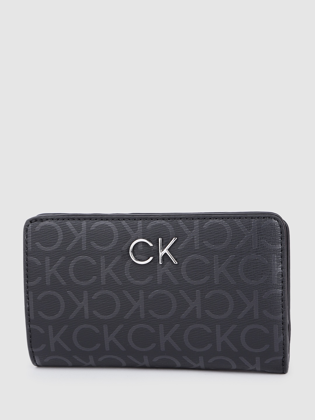Calvin Klein Women Brand Logo Printed PU Two Fold & Zip Around Wallet With RFID Protection, Black
Calvin Klein Women Brand Logo Printed PU Two Fold & Zip Around Wallet With RFID Protection, Black