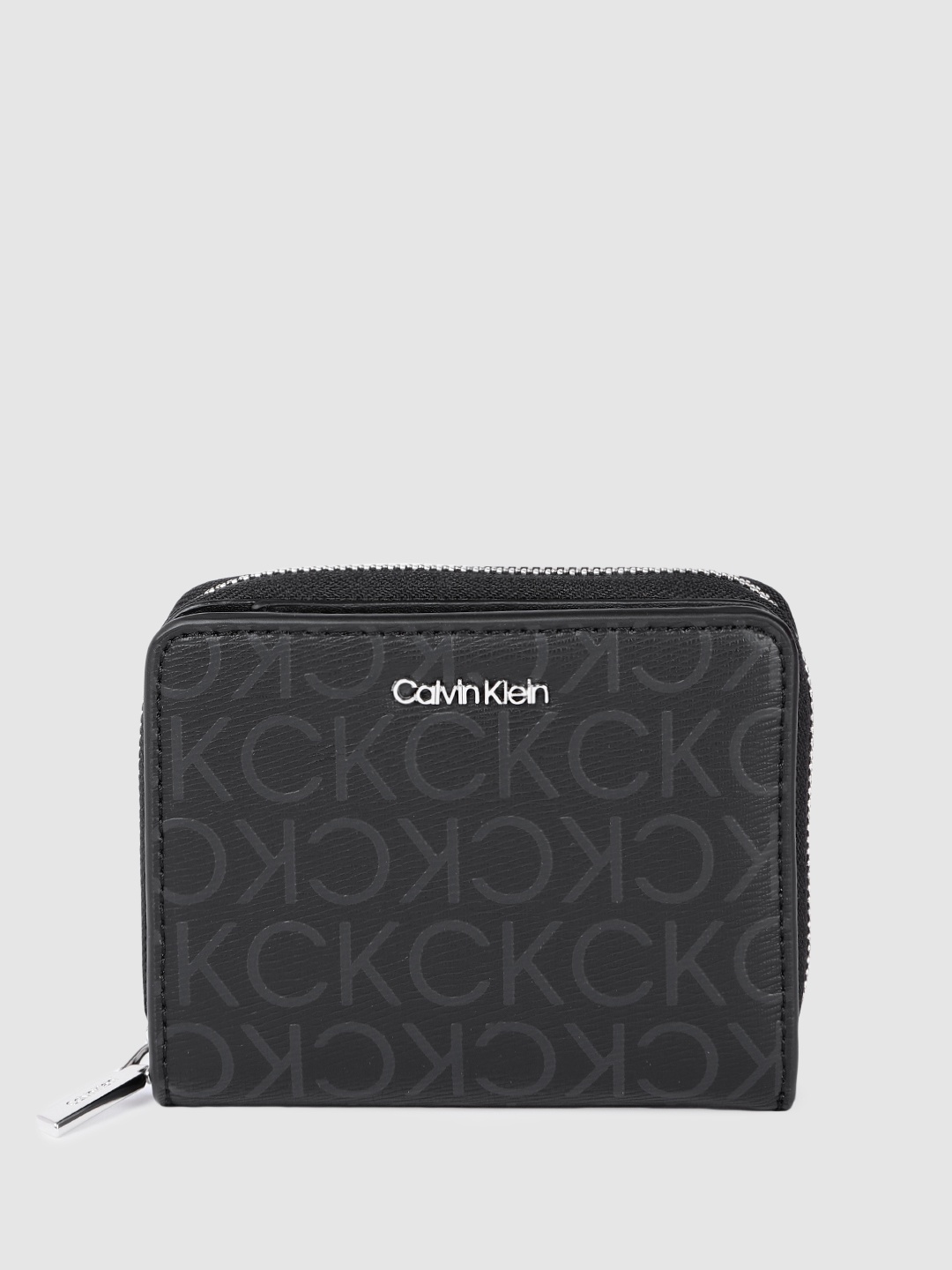 Calvin Klein Women Brand Logo Print PU Two Fold & Zip Around Wallet With RFID Protection, Black
Calvin Klein Women Brand Logo Print PU Two Fold & Zip Around Wallet With RFID Protection, Black