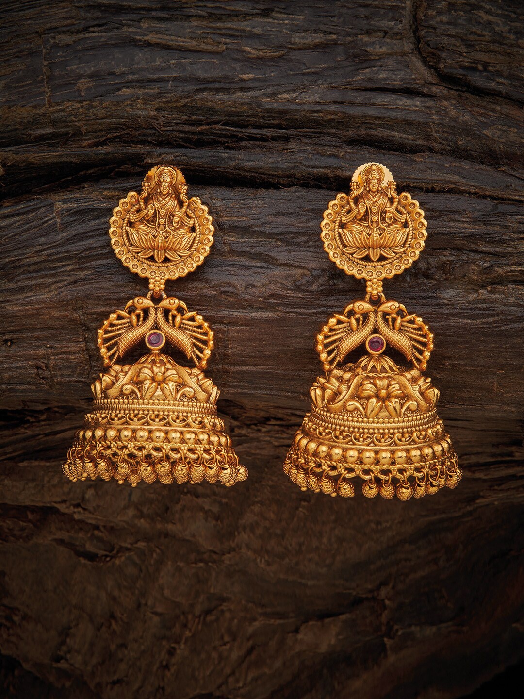 Kushal's Fashion Jewellery Gold-Plated Stones Studded Dome Shaped Temple Jhumkas
Kushal's Fashion Jewellery Gold-Plated Stones Studded Dome Shaped Temple Jhumkas