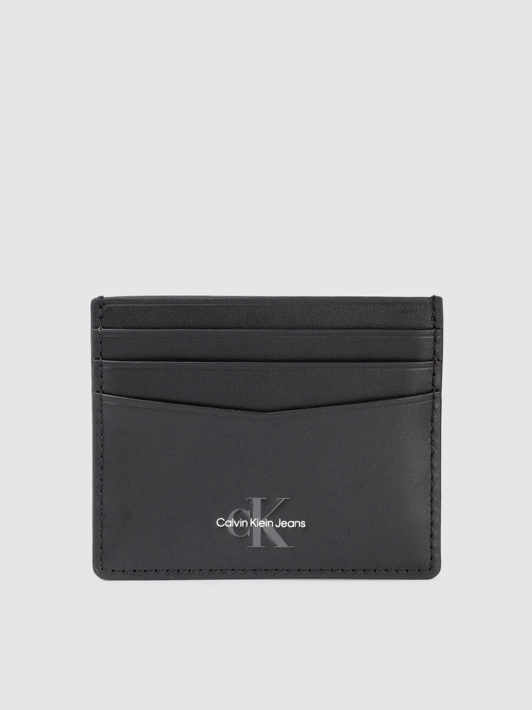 Calvin Klein Men Solid Leather Card Holder With Minimal Brand Logo Print Detail, Black
Calvin Klein Men Solid Leather Card Holder With Minimal Brand Logo Print Detail, Black