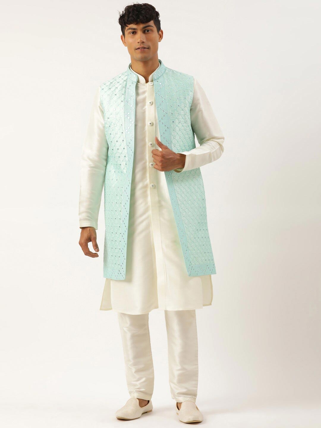 TheEthnic.Co Geometric Embroidered Mirror Work Pure Silk Longline Nehru Jacket, Blue
TheEthnic.Co Geometric Embroidered Mirror Work Pure Silk Longline Nehru Jacket, Blue
