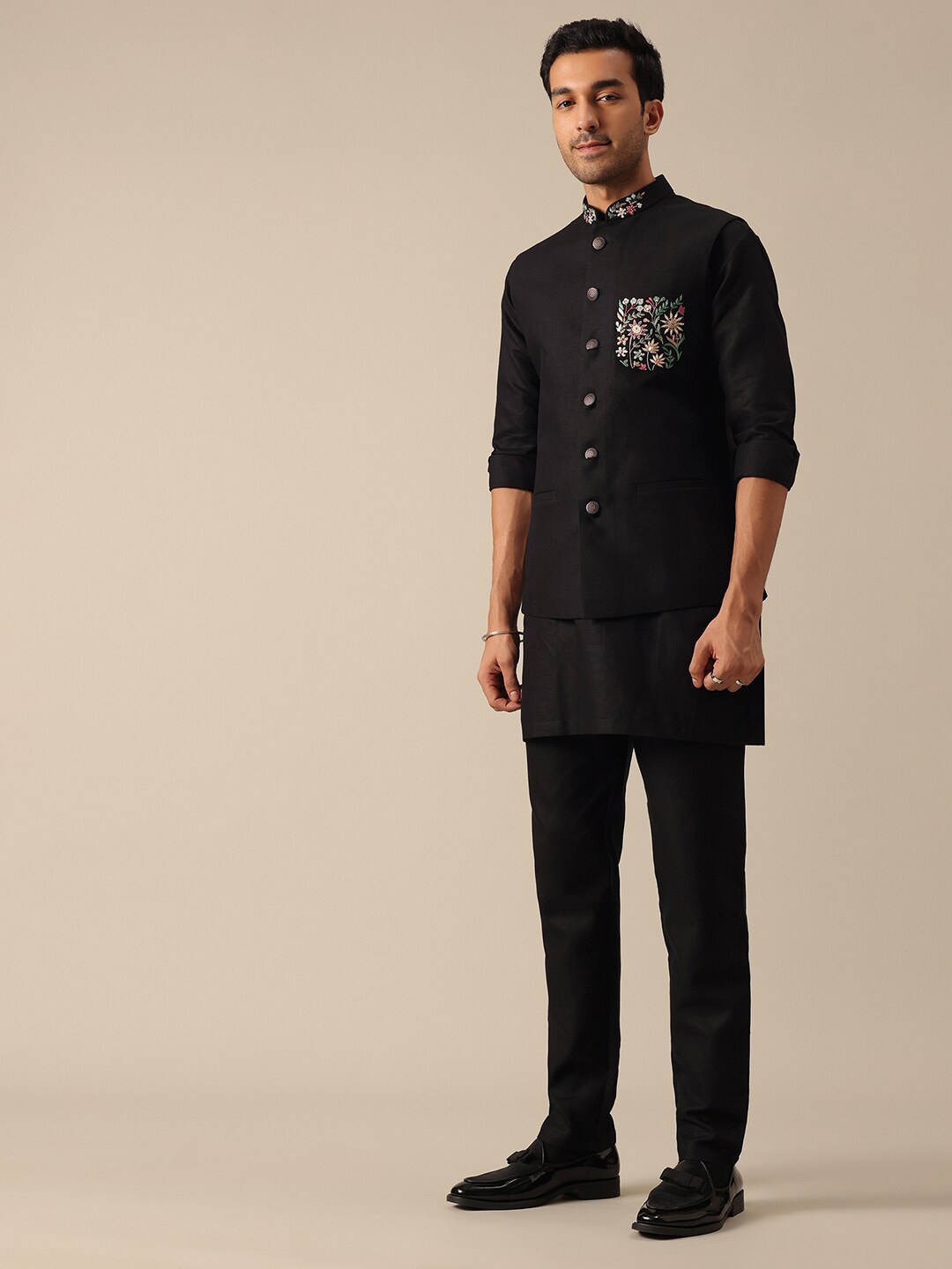 KALKI Fashion Floral Embroidered Straight Kurta with Trousers & Nehru jacket, Black
KALKI Fashion Floral Embroidered Straight Kurta with Trousers & Nehru jacket, Black