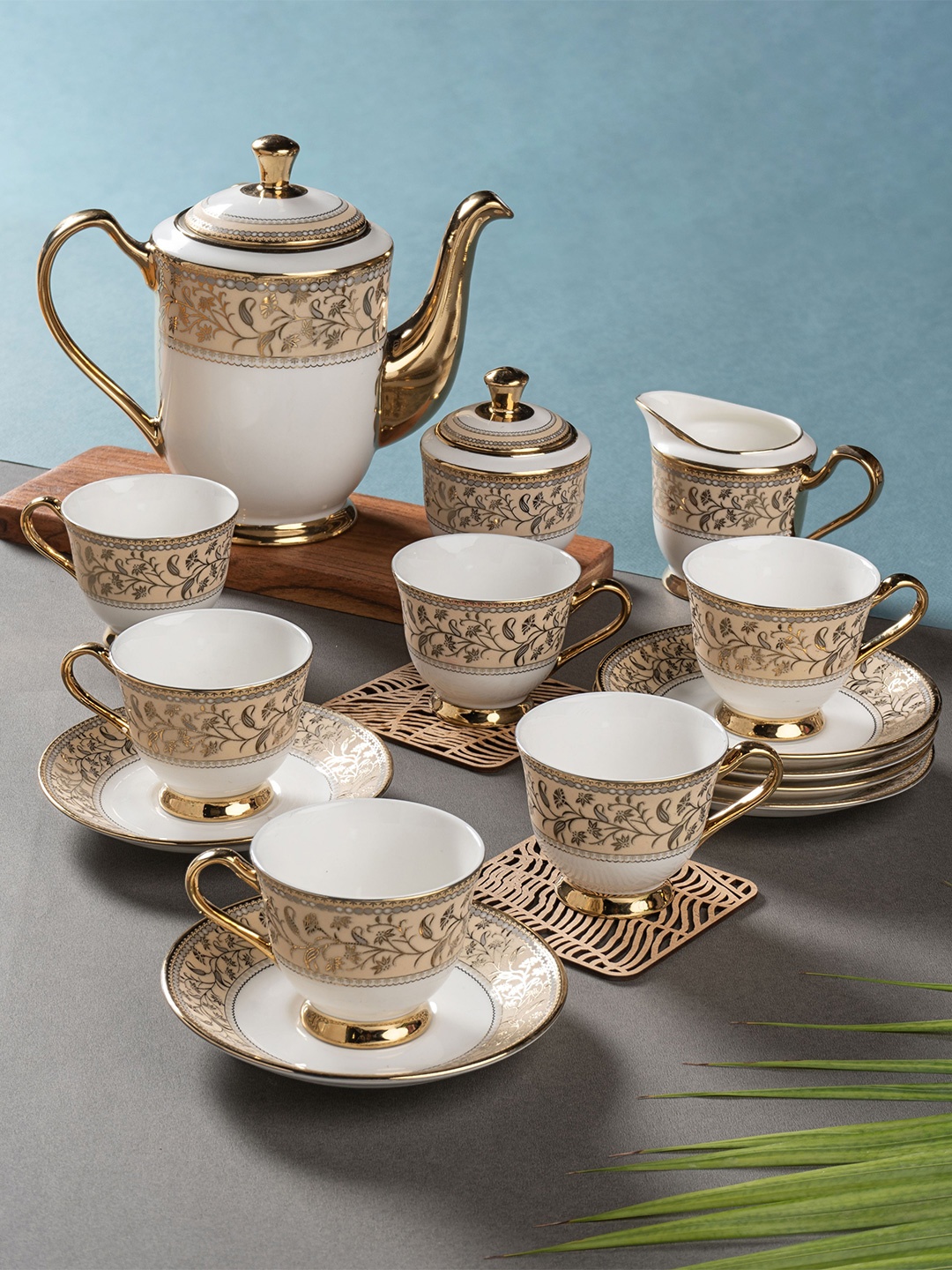 CLAY CRAFT Gold-Toned White 15 Pieces Floral Printed Ceramic Glossy Kettle Set
CLAY CRAFT Gold-Toned White 15 Pieces Floral Printed Ceramic Glossy Kettle Set