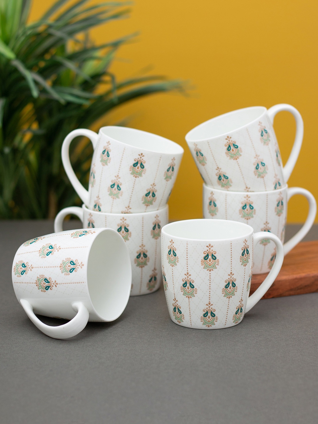 CLAY CRAFT White & Green 6Pcs Printed Ceramic Glossy Cups Set Of Cups & Mugs 200Ml Each
CLAY CRAFT White & Green 6Pcs Printed Ceramic Glossy Cups Set Of Cups & Mugs 200Ml Each