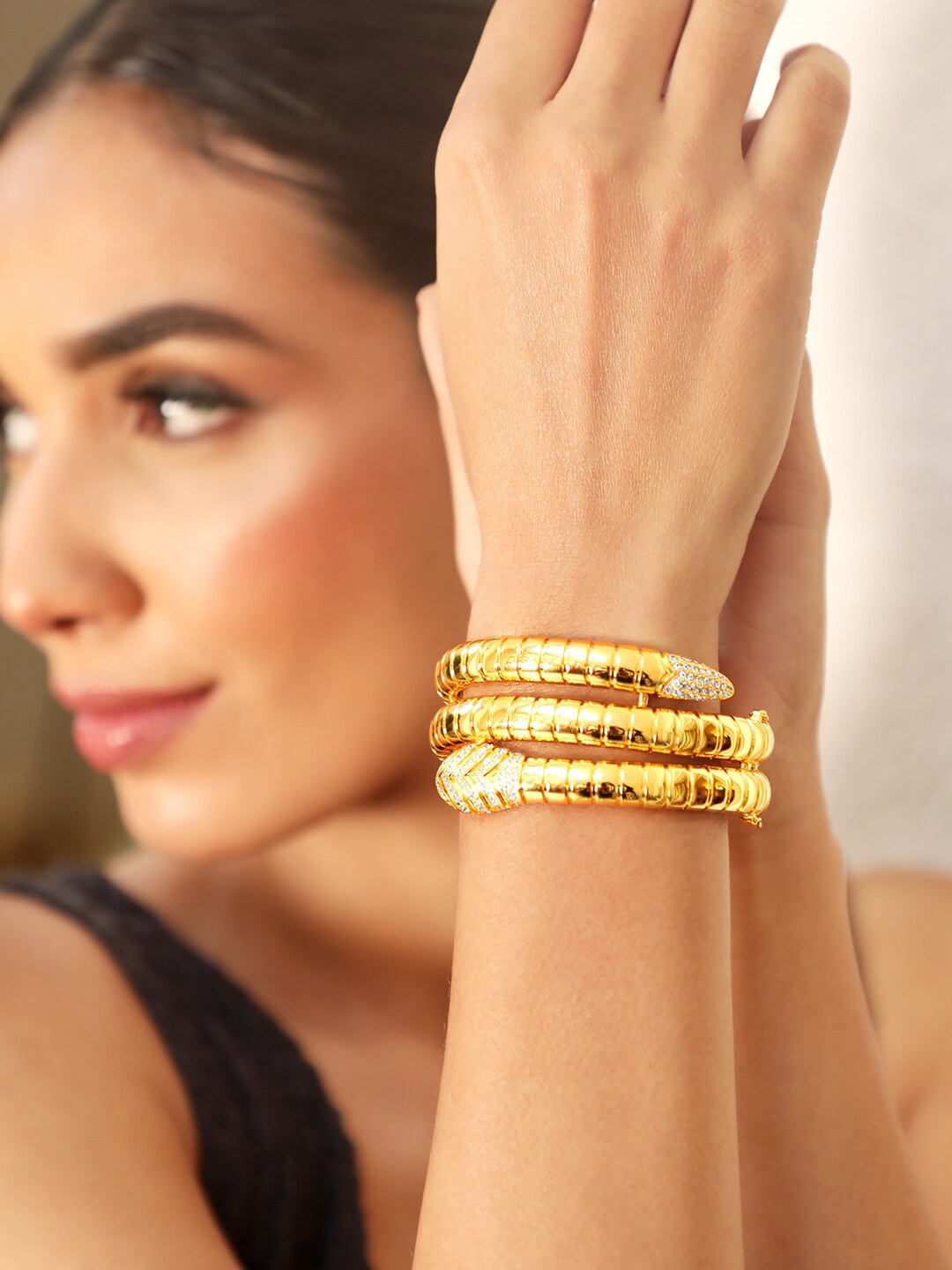 Rubans Voguish 22K Gold-Plated Cubic Zirconia Studded Triple Layer Bangle-Style Bracelet
Rubans Voguish 22K Gold-Plated Cubic Zirconia Studded Triple Layer Bangle-Style Bracelet