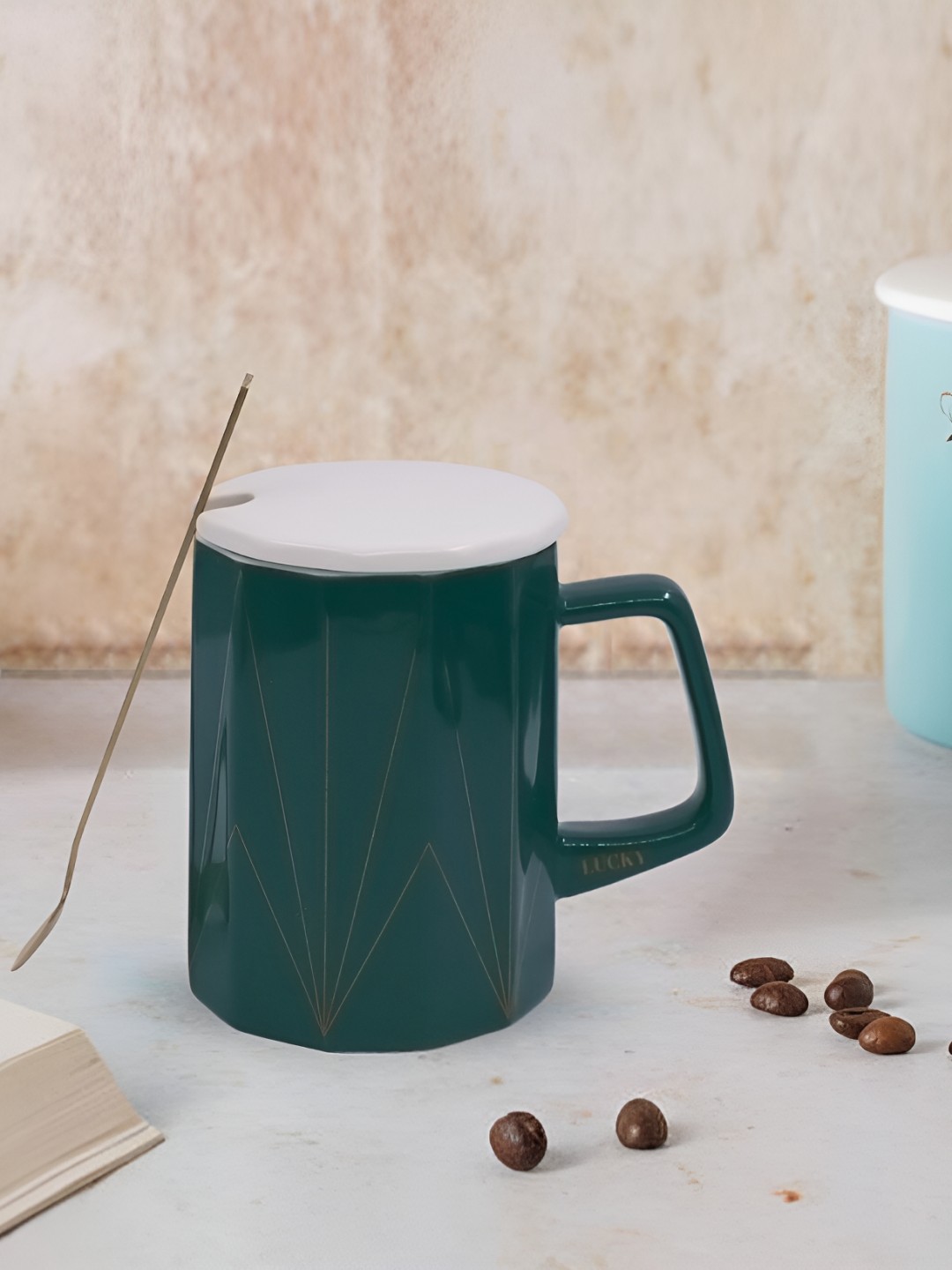 Kookee Green and GoldToned Printed Ceramic Mugs with Lid and Handle with Spoon 325 ml
Kookee Green and GoldToned Printed Ceramic Mugs with Lid and Handle with Spoon 325 ml