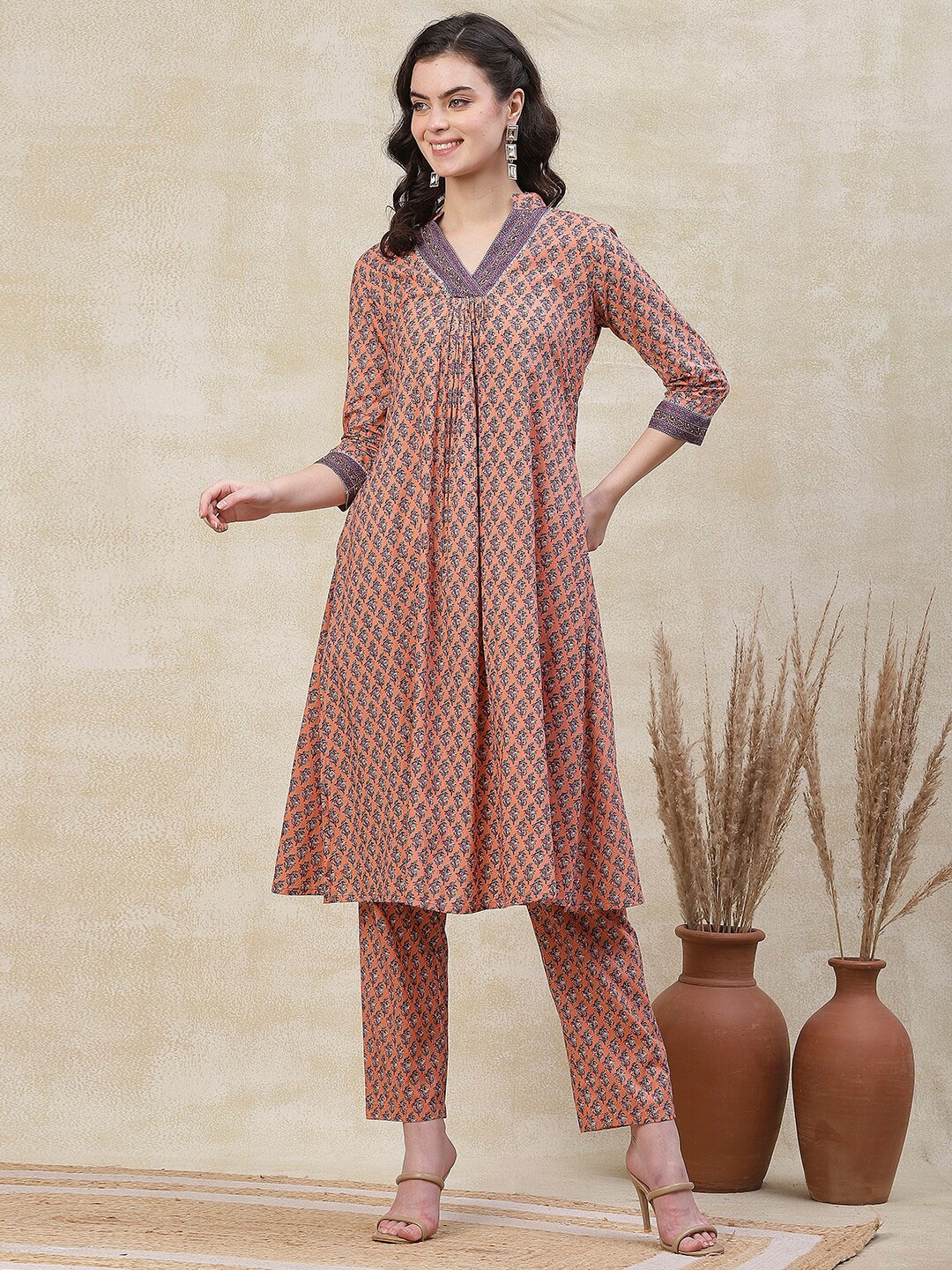 FASHOR Floral Printed A-Line Pleated Thread Work Pure Cotton Kurta with Trousers, Peach
FASHOR Floral Printed A-Line Pleated Thread Work Pure Cotton Kurta with Trousers, Peach