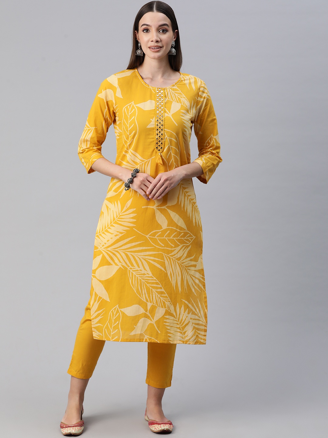 Readiprint Women Floral Printed Mirror Work Pure Cotton Kurta with Trousers, Mustard
Readiprint Women Floral Printed Mirror Work Pure Cotton Kurta with Trousers, Mustard