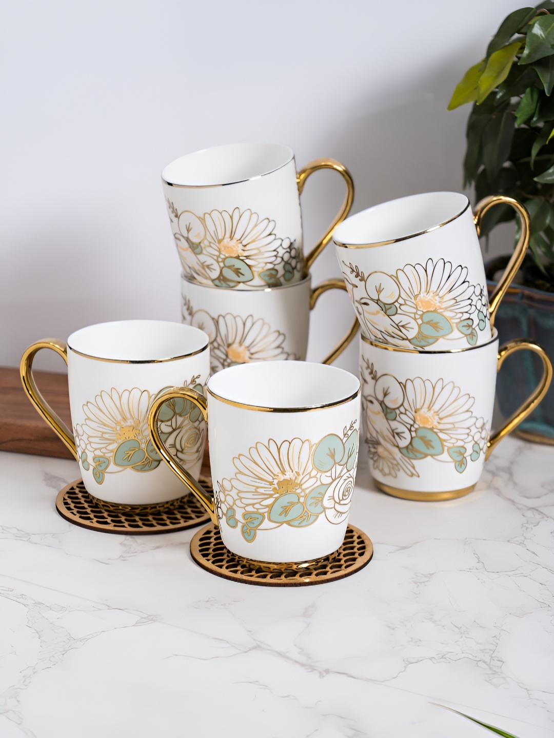 JCPL White & Gold Toned 6 Pieces Floral Printed Ceramic Glossy Tea Cups 200 ml Each
JCPL White & Gold Toned 6 Pieces Floral Printed Ceramic Glossy Tea Cups 200 ml Each