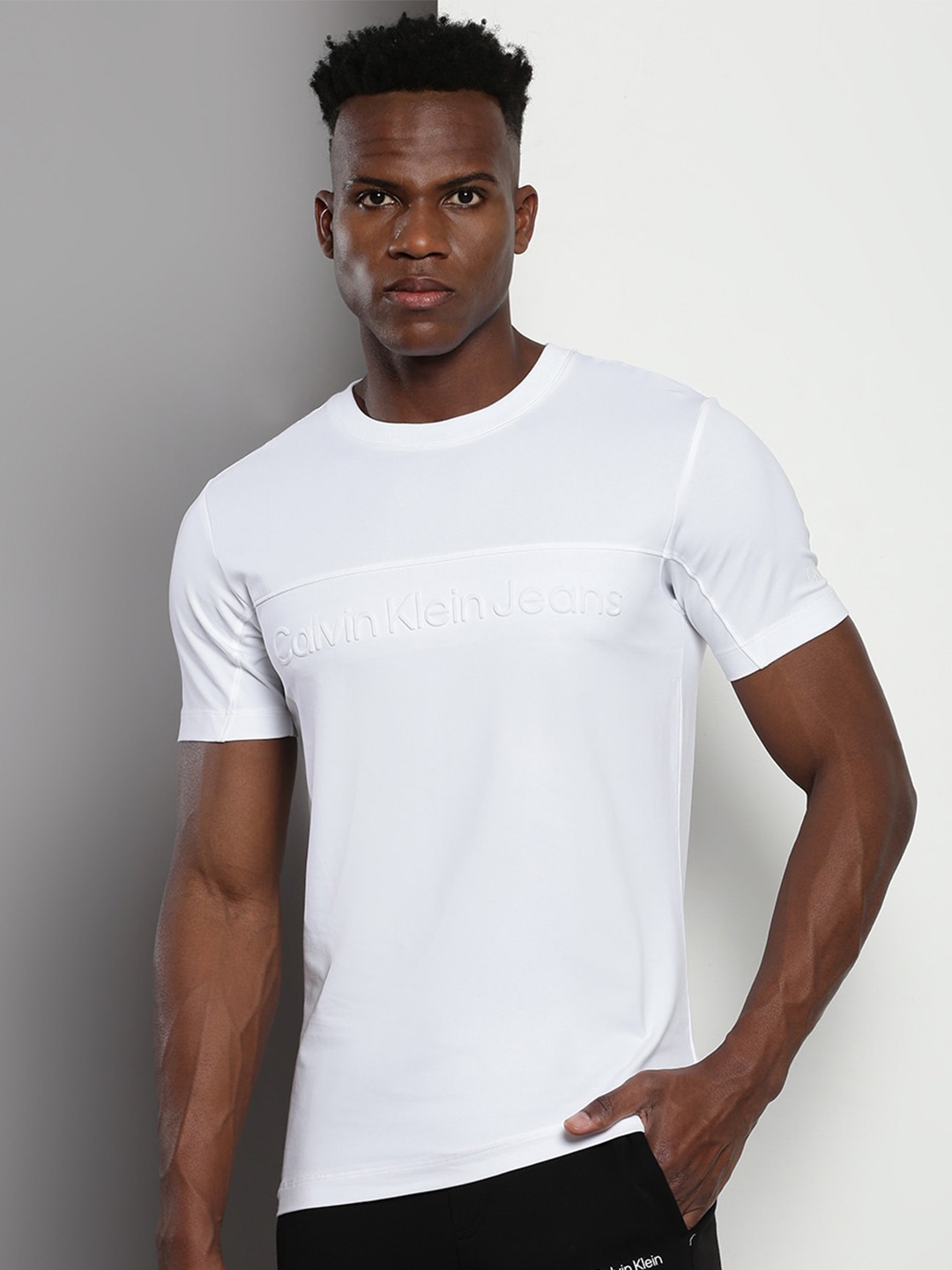 Calvin Klein Jeans Brand Logo Embellished Round Neck Short Sleeves Cotton Slim Fit T-shirt, White
Calvin Klein Jeans Brand Logo Embellished Round Neck Short Sleeves Cotton Slim Fit T-shirt, White