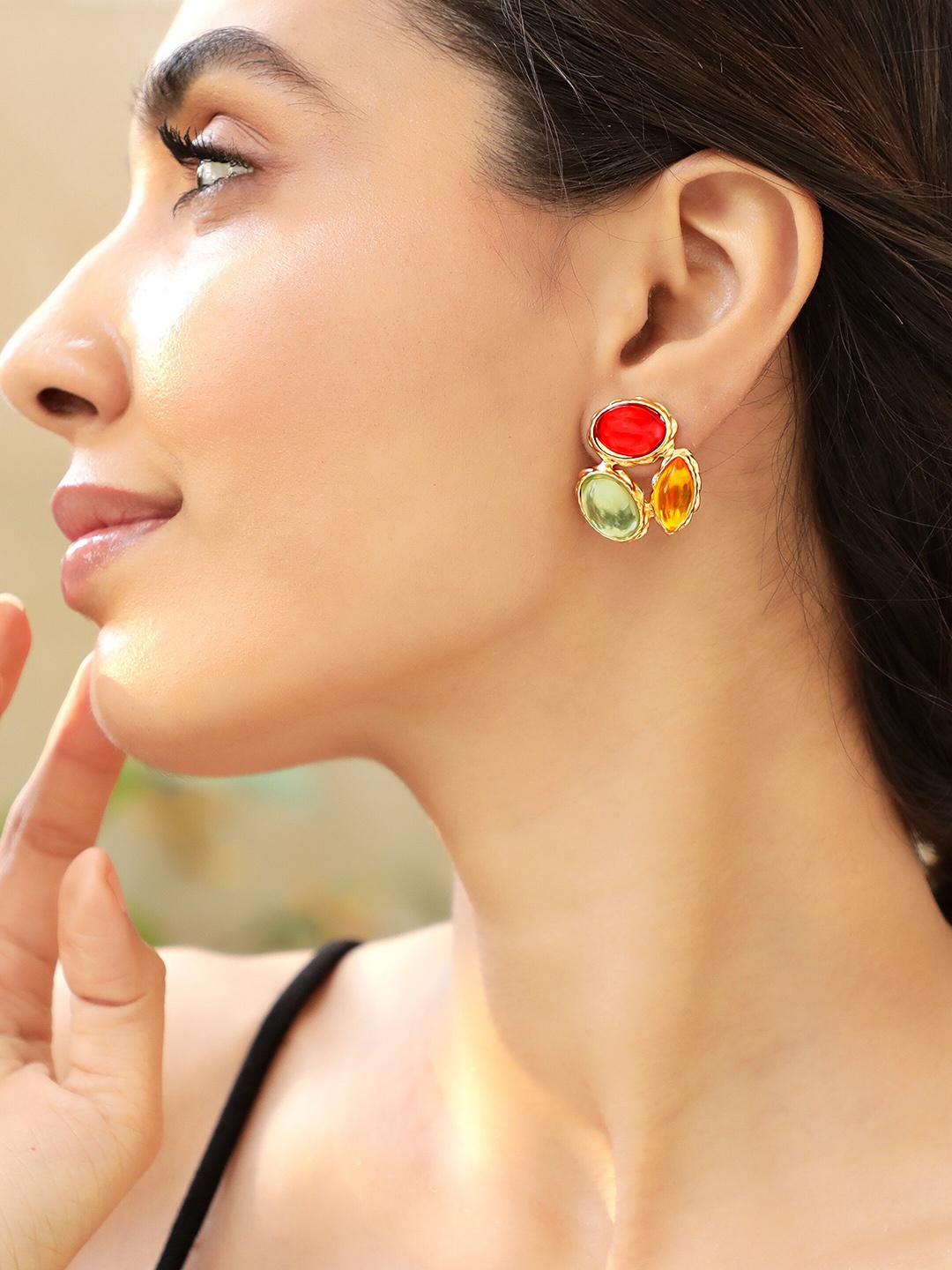 Rubans Voguish 18K Gold Plated Multicolor Oval Stud Earring with Red Green & Amber Stones
Rubans Voguish 18K Gold Plated Multicolor Oval Stud Earring with Red Green & Amber Stones