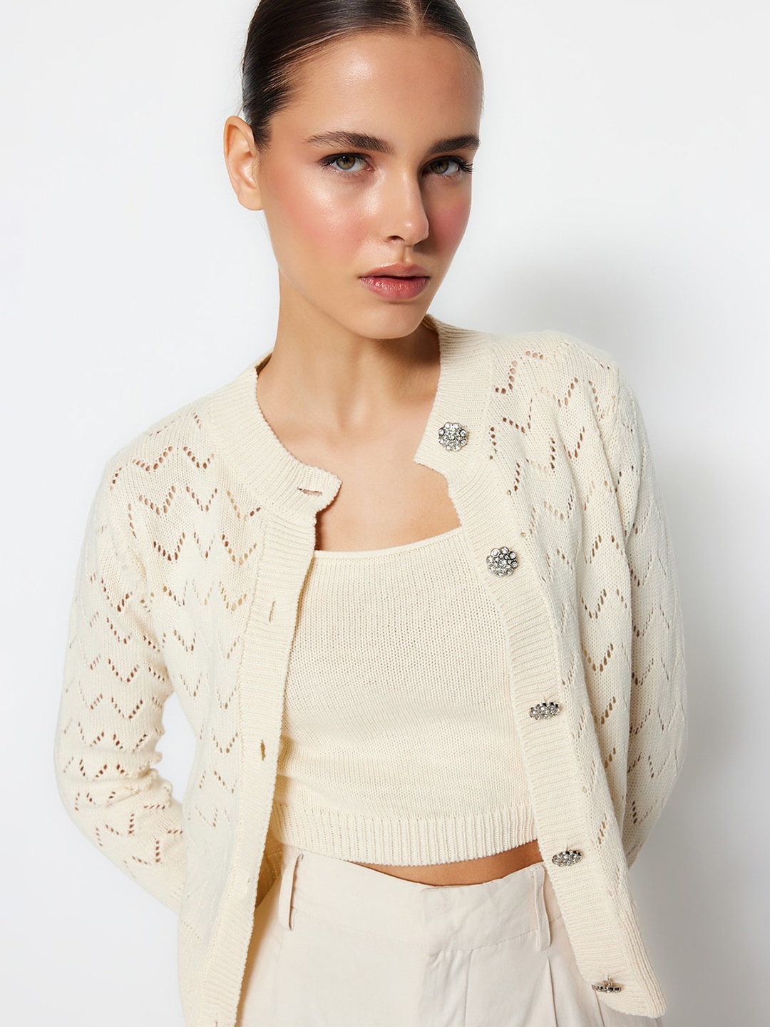 Trendyol Open Knit Self Design Stand Collar Acrylic Cardigan Sweater With Top, Off white
Trendyol Open Knit Self Design Stand Collar Acrylic Cardigan Sweater With Top, Off white