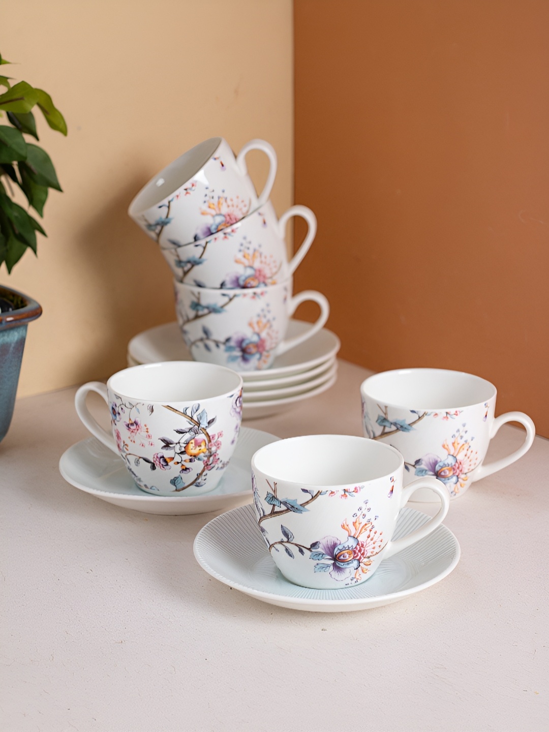 JCPL White & Blue 12 Pieces Floral Printed Ceramic Glossy Cups And Saucers 180 ml Each
JCPL White & Blue 12 Pieces Floral Printed Ceramic Glossy Cups And Saucers 180 ml Each