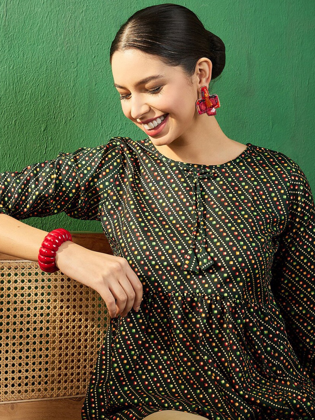 Sangria Green Bandhani Printed Round Neck Bell Sleeves Empire Style A-Line Short Kurti
Sangria Green Bandhani Printed Round Neck Bell Sleeves Empire Style A-Line Short Kurti