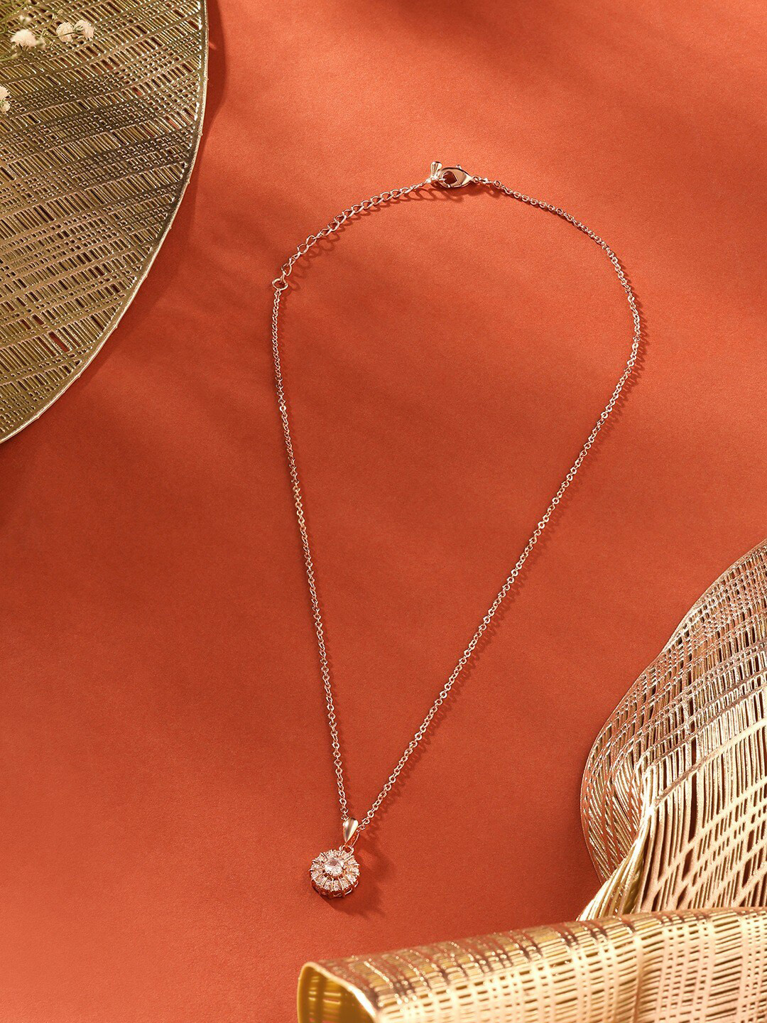 AMI Rose Gold-Plated Cubic Zirconia Studded Pendant With Chain
AMI Rose Gold-Plated Cubic Zirconia Studded Pendant With Chain