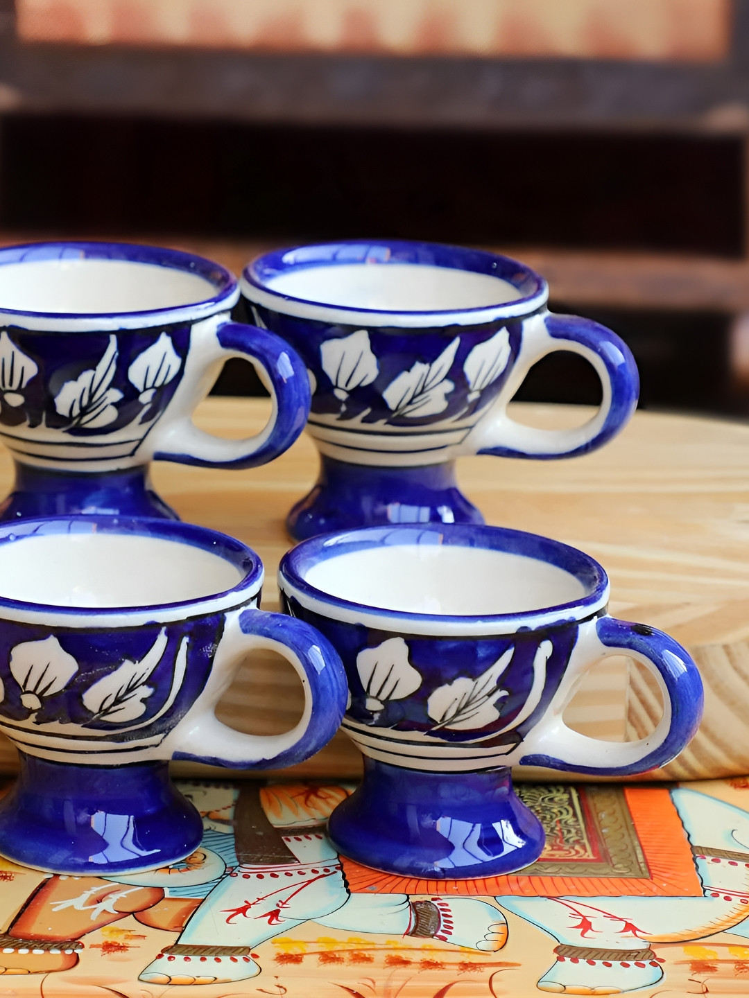 INDIA MEETS INDIA Blue & White 4 Pieces Printed Glossy Finish Ceramic Cups 100 ml Each 
INDIA MEETS INDIA Blue & White 4 Pieces Printed Glossy Finish Ceramic Cups 100 ml Each