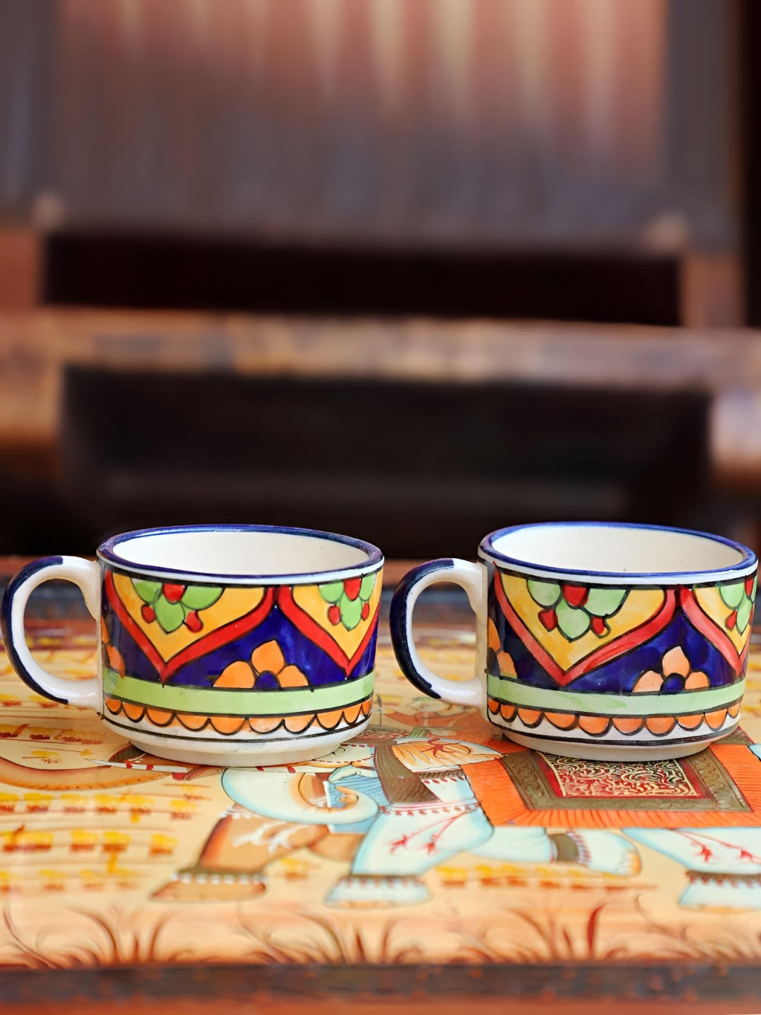 INDIA MEETS INDIA Blue & Orange 2 Pieces Printed Glossy Finish Ceramic Mugs 100 ml Each
INDIA MEETS INDIA Blue & Orange 2 Pieces Printed Glossy Finish Ceramic Mugs 100 ml Each
