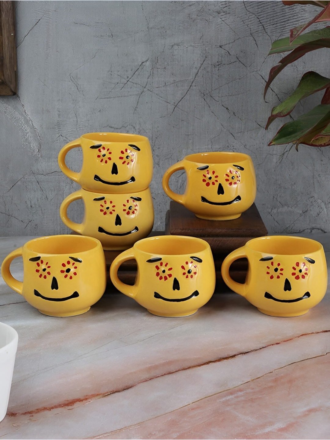 The Decor Lane Yellow & Red 6 Pieces Printed Glossy Finished Ceramic Cups 150 ml Each
The Decor Lane Yellow & Red 6 Pieces Printed Glossy Finished Ceramic Cups 150 ml Each