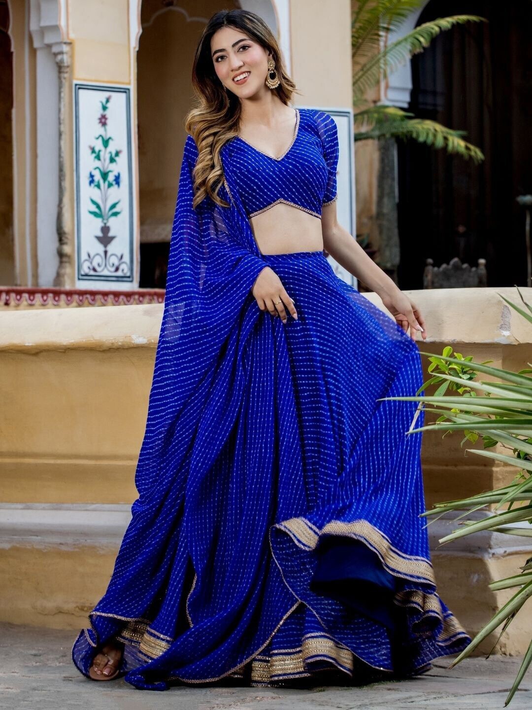 KALINI Printed Ready to Wear Gotta Patti Lehenga & Unstitched Blouse With Dupatta, Blue
KALINI Printed Ready to Wear Gotta Patti Lehenga & Unstitched Blouse With Dupatta, Blue