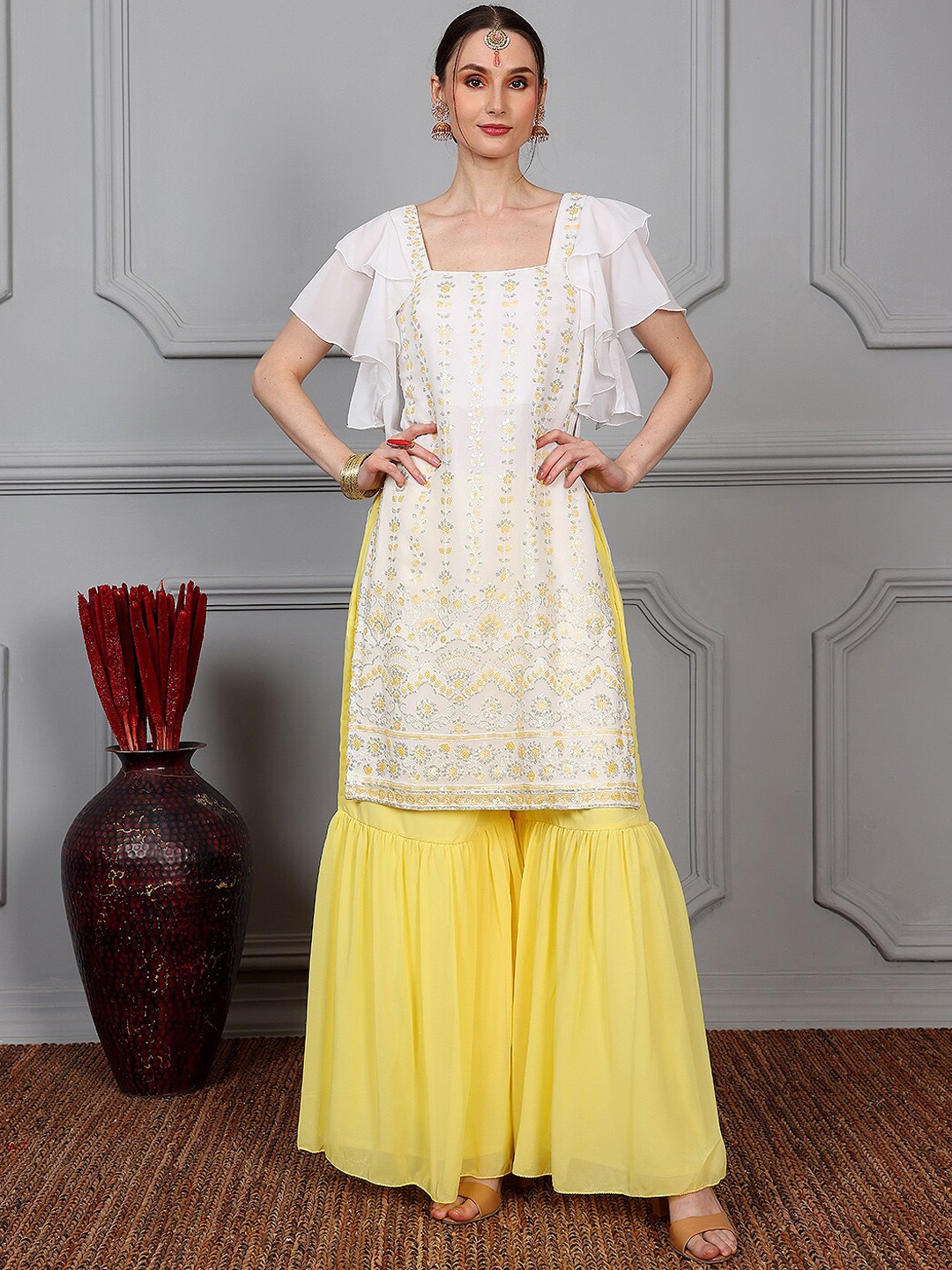 Ethnovog Floral Embroidered Sequinned Square Neck Kurta with Sharara & Dupatta, White
Ethnovog Floral Embroidered Sequinned Square Neck Kurta with Sharara & Dupatta, White