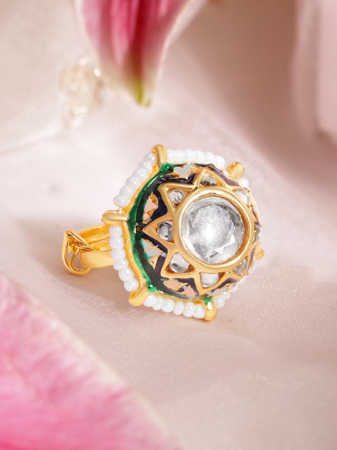 Rubans 22K Gold Plated Kundan Crystal Pearl Detailed with Green Enamel Adjustable Ring
Rubans 22K Gold Plated Kundan Crystal Pearl Detailed with Green Enamel Adjustable Ring