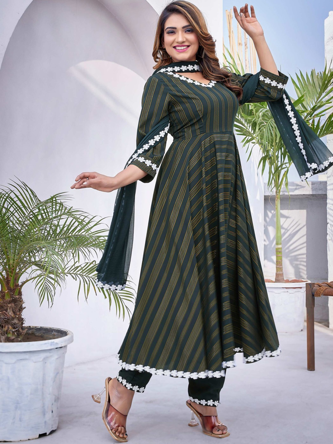 Titanium Silk Industries Striped V Neck Regular Anarkali Kurta with Trousers & Dupatta, Green
Titanium Silk Industries Striped V Neck Regular Anarkali Kurta with Trousers & Dupatta, Green