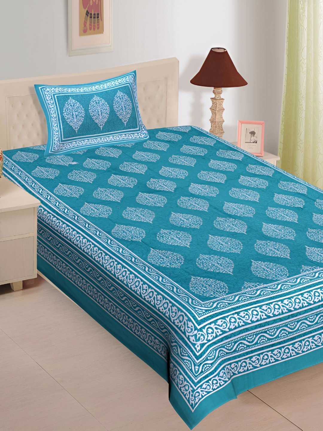UNIBLISS Blue & White Floral Printed Cotton 144 TC Single Bedsheet With 1 Pillow Cover
UNIBLISS Blue & White Floral Printed Cotton 144 TC Single Bedsheet With 1 Pillow Cover