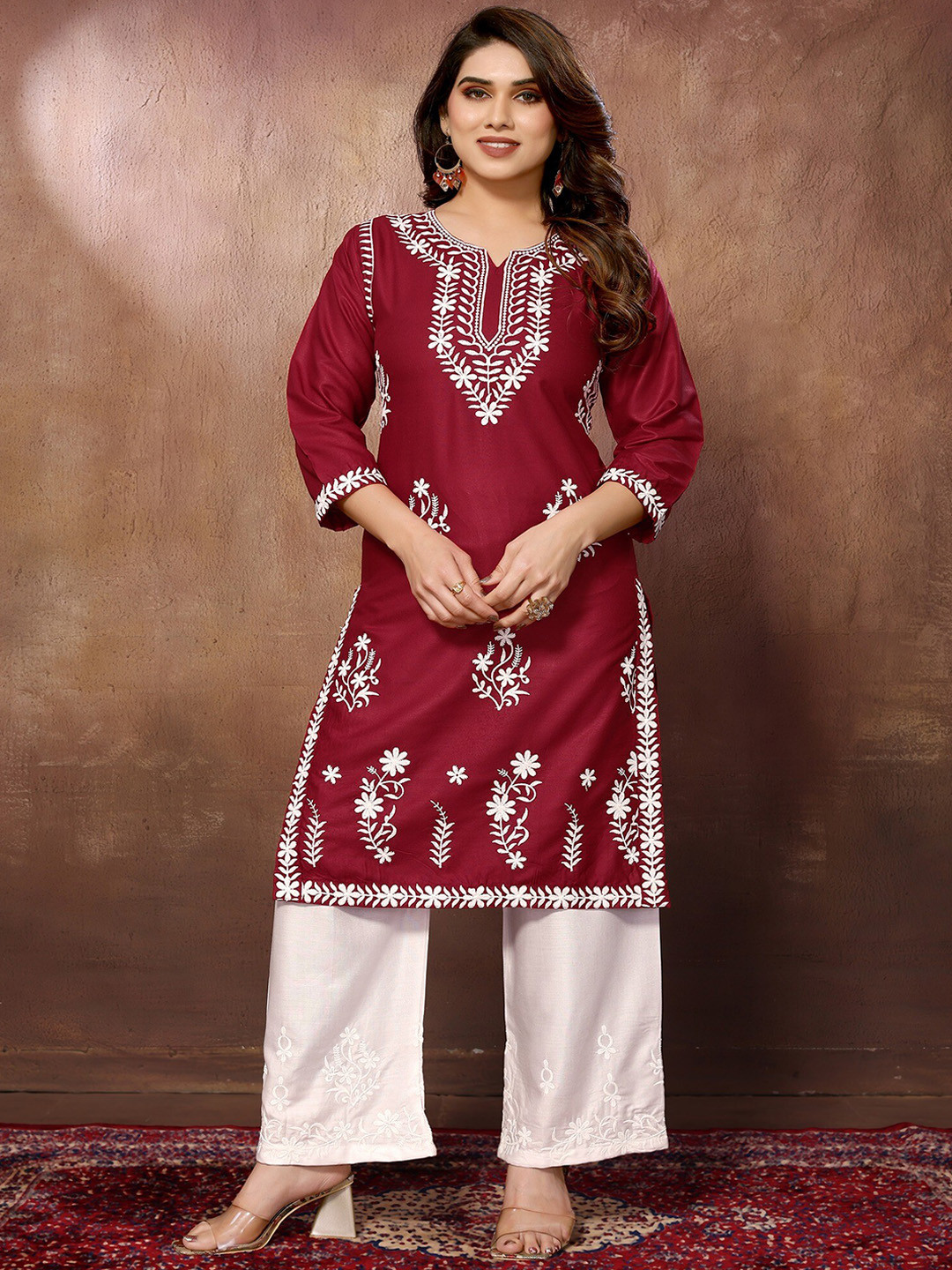 FABMORA Floral Embroidered Round Neck Three-Quarter Sleeves Chikankari Kurta with Palazzos, Maroon
FABMORA Floral Embroidered Round Neck Three-Quarter Sleeves Chikankari Kurta with Palazzos, Maroon