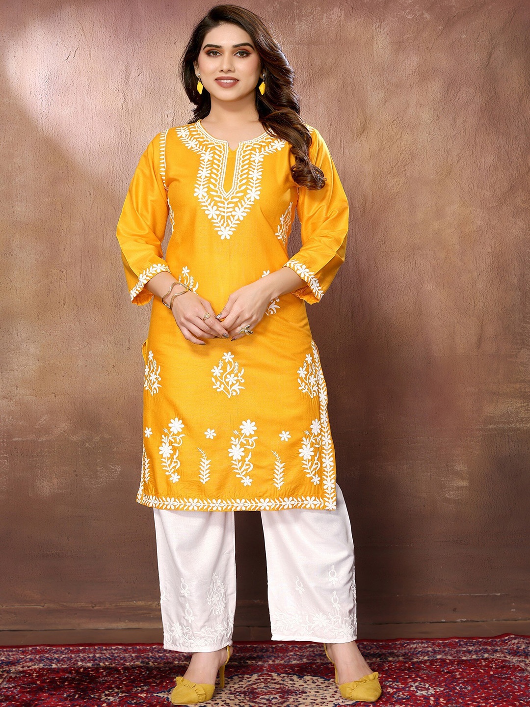 FABMORA Floral Embroidered Round Neck Three-Quarter Sleeves Chikankari Kurta with Palazzos, Yellow
FABMORA Floral Embroidered Round Neck Three-Quarter Sleeves Chikankari Kurta with Palazzos, Yellow