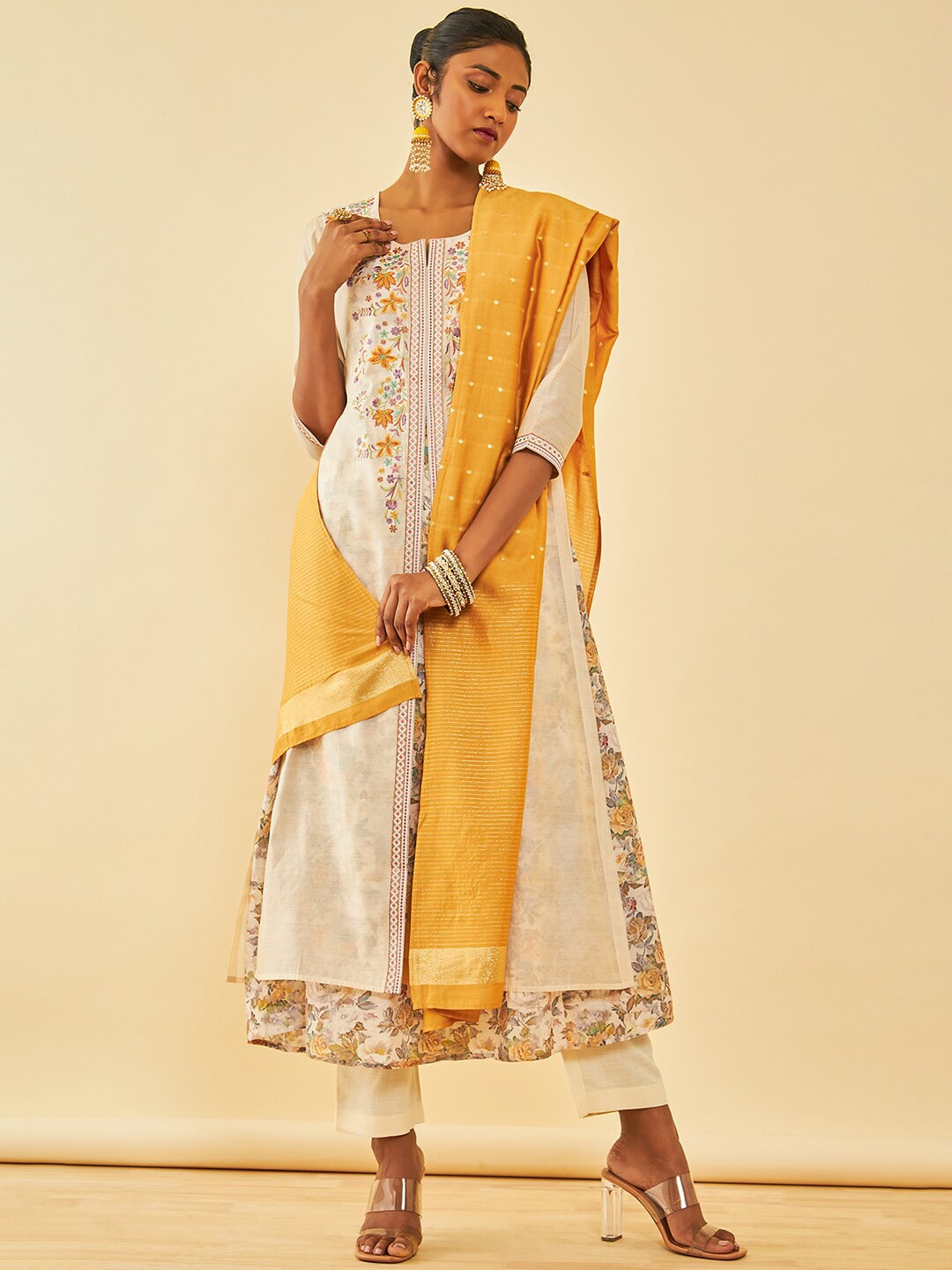 Soch Cream Floral Embroidered Thread Work Layered A-Line Kurta With Trousers & Dupatta
Soch Cream Floral Embroidered Thread Work Layered A-Line Kurta With Trousers & Dupatta