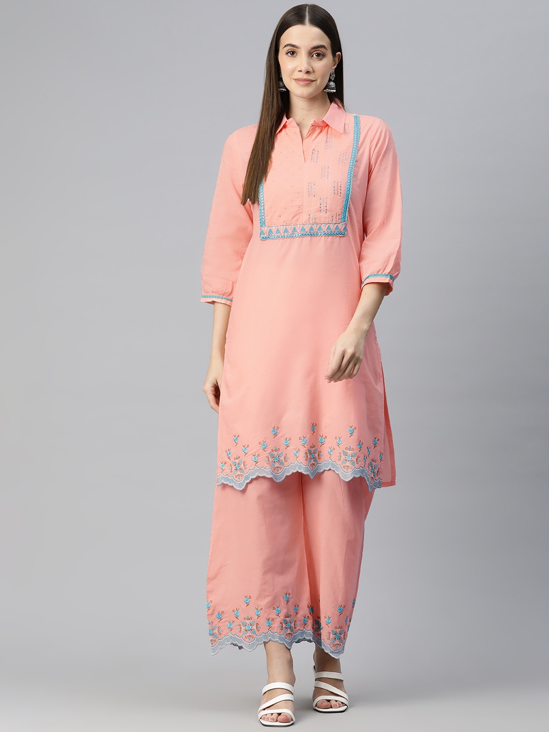 Readiprint Fashions Women Floral Embroidered Regular Sequinned Pure Cotton Kurta with Palazzos, Peach
Readiprint Fashions Women Floral Embroidered Regular Sequinned Pure Cotton Kurta with Palazzos, Peach
