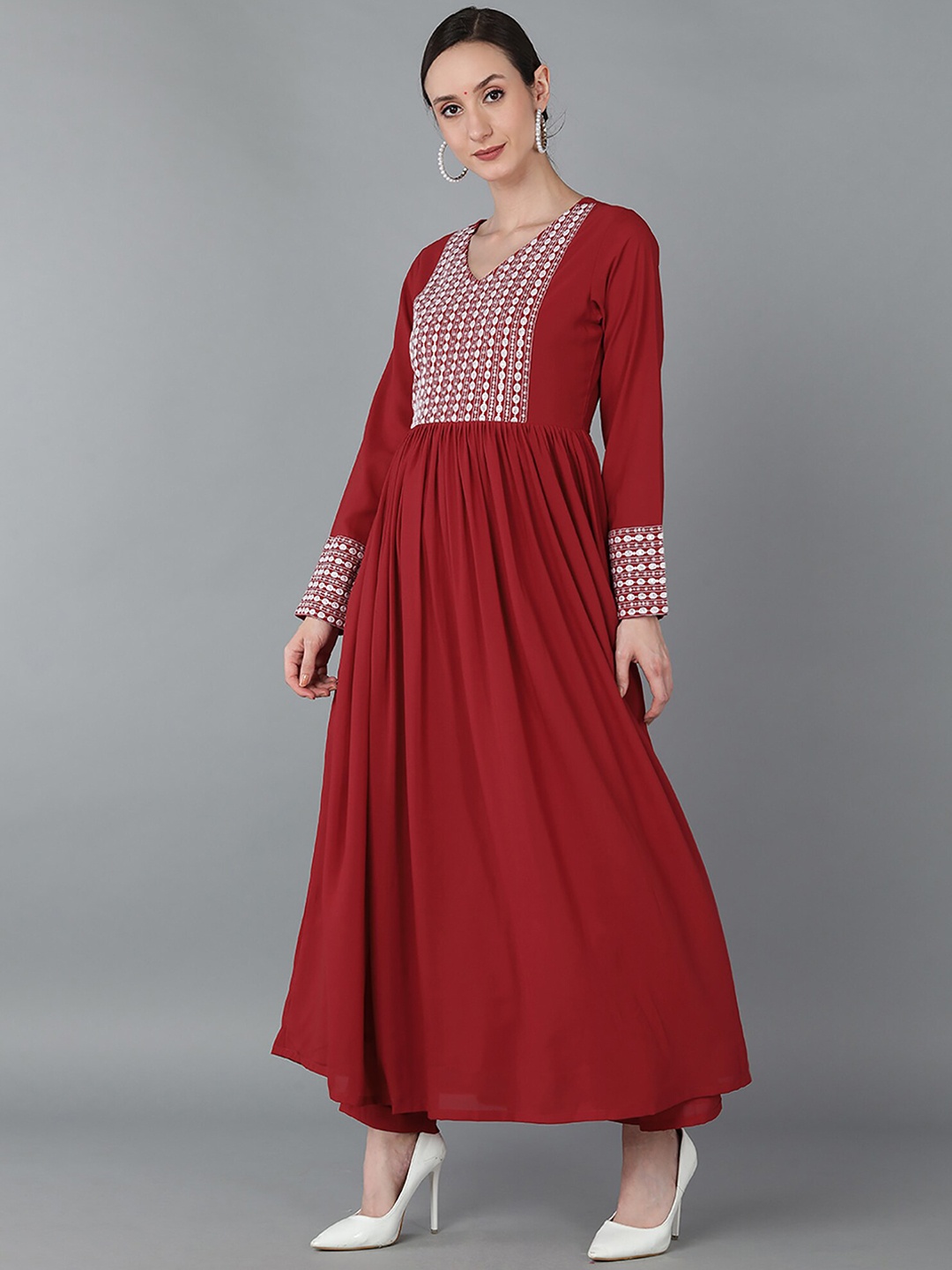 KALINI V-Neck Embroidered Empire Thread Work Kurta with Trousers & With Dupatta, Red
KALINI V-Neck Embroidered Empire Thread Work Kurta with Trousers & With Dupatta, Red