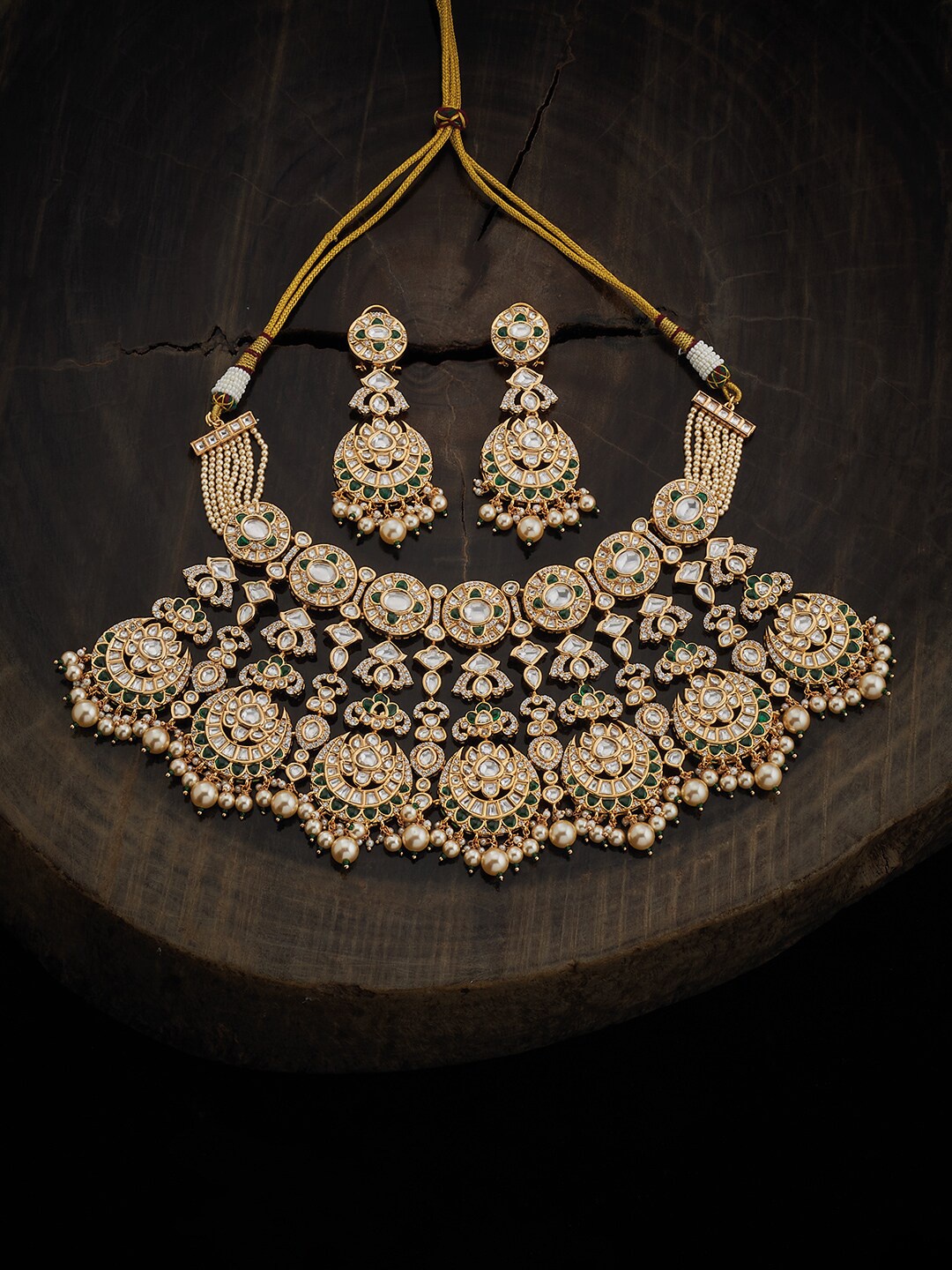 Kushal's Fashion Jewellery Gold Plated Kundan Studded & Beaded Antique Jewellery Set
Kushal's Fashion Jewellery Gold Plated Kundan Studded & Beaded Antique Jewellery Set